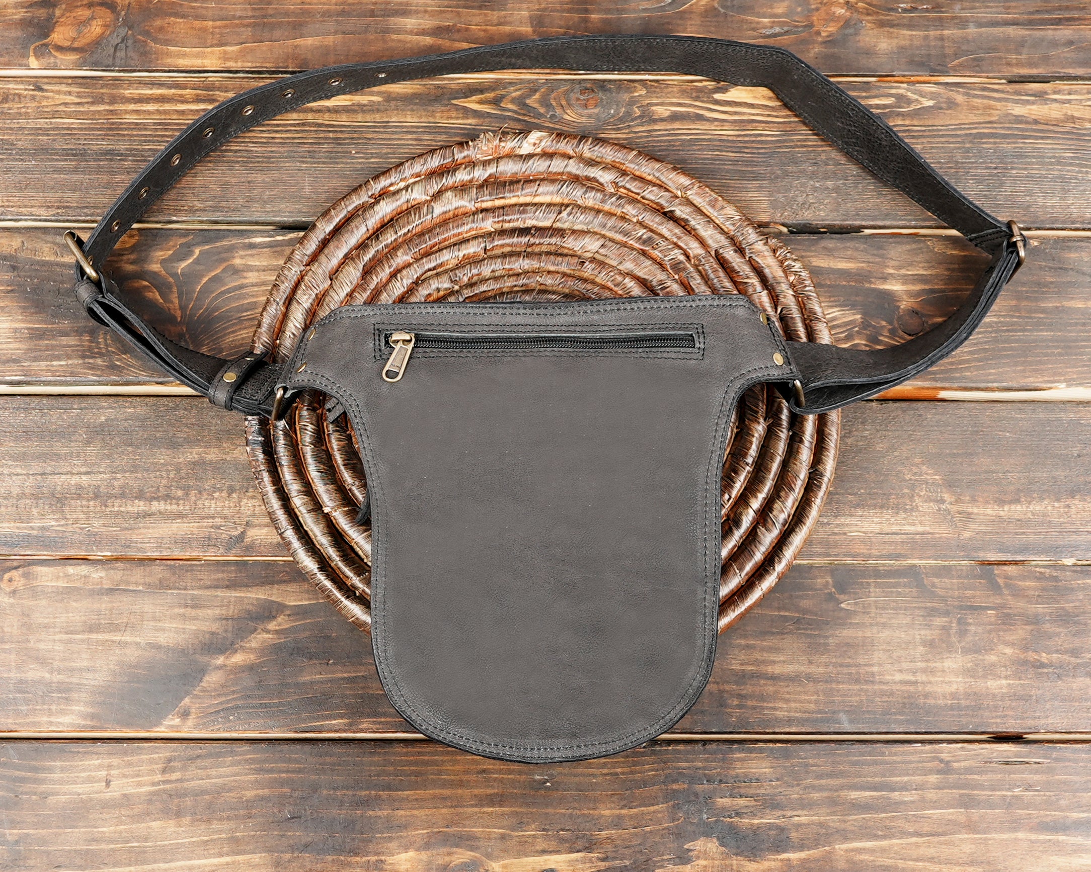 Minimal leather waist belt with studded pouch detail