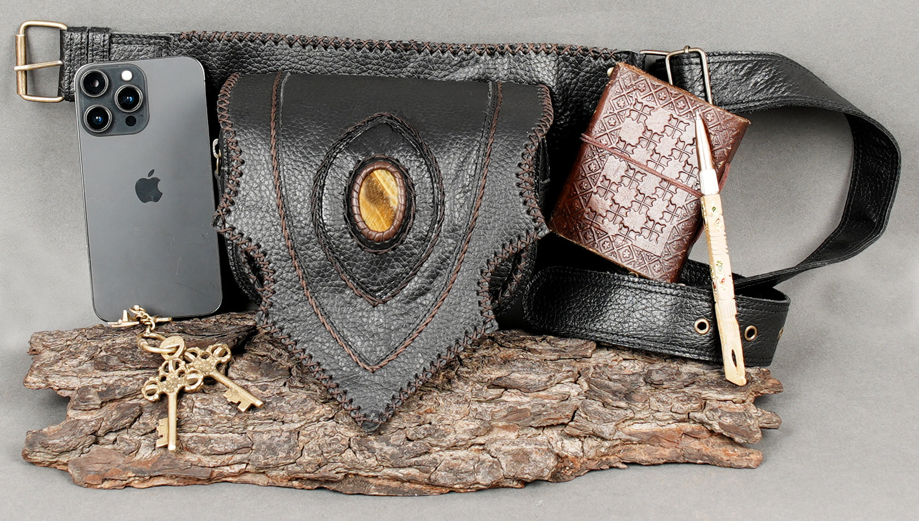 Leather utility belt for festivals with decorative central stone