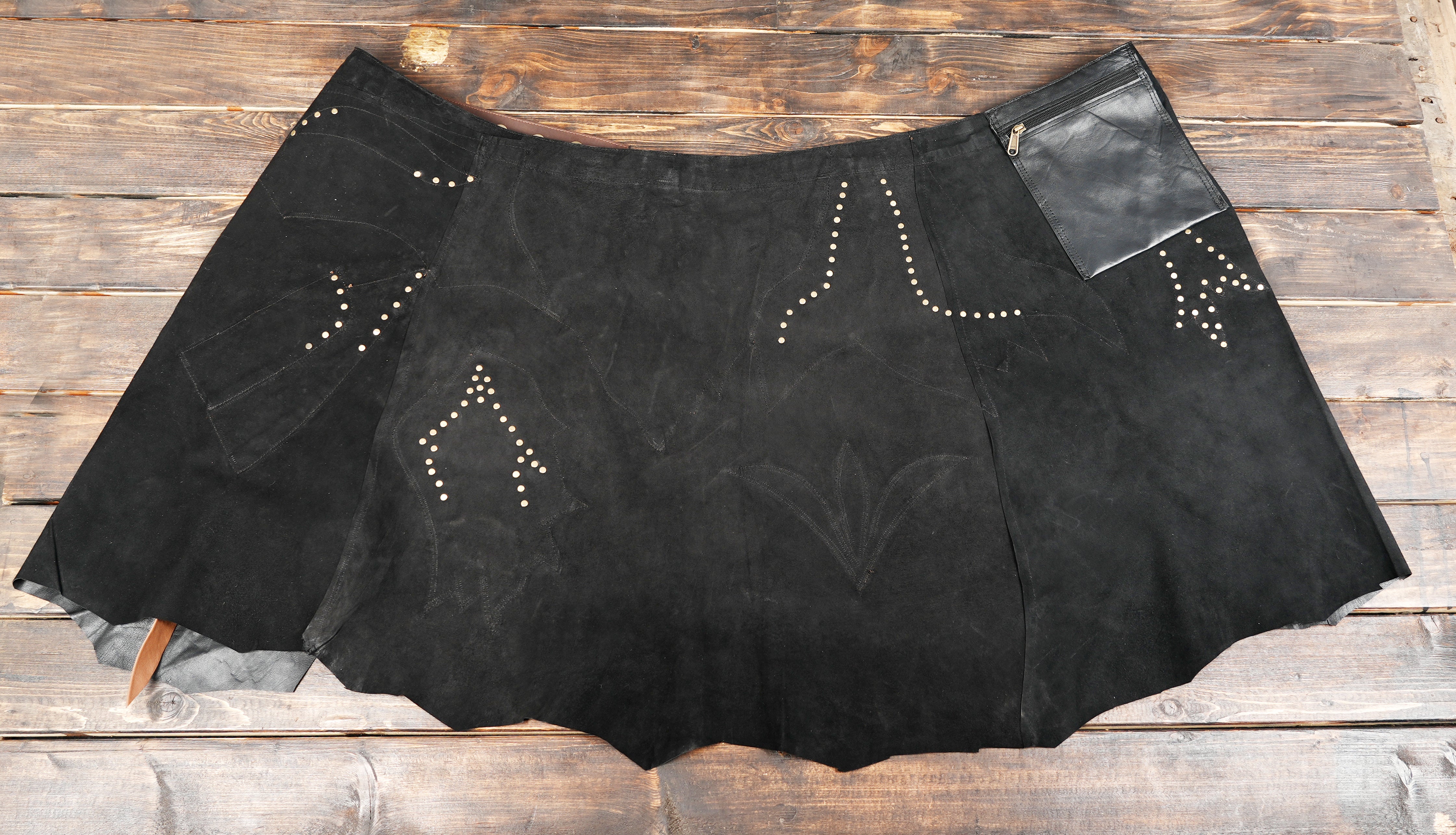 Luxury leather skirt with detailed craftsmanship and unique styling
