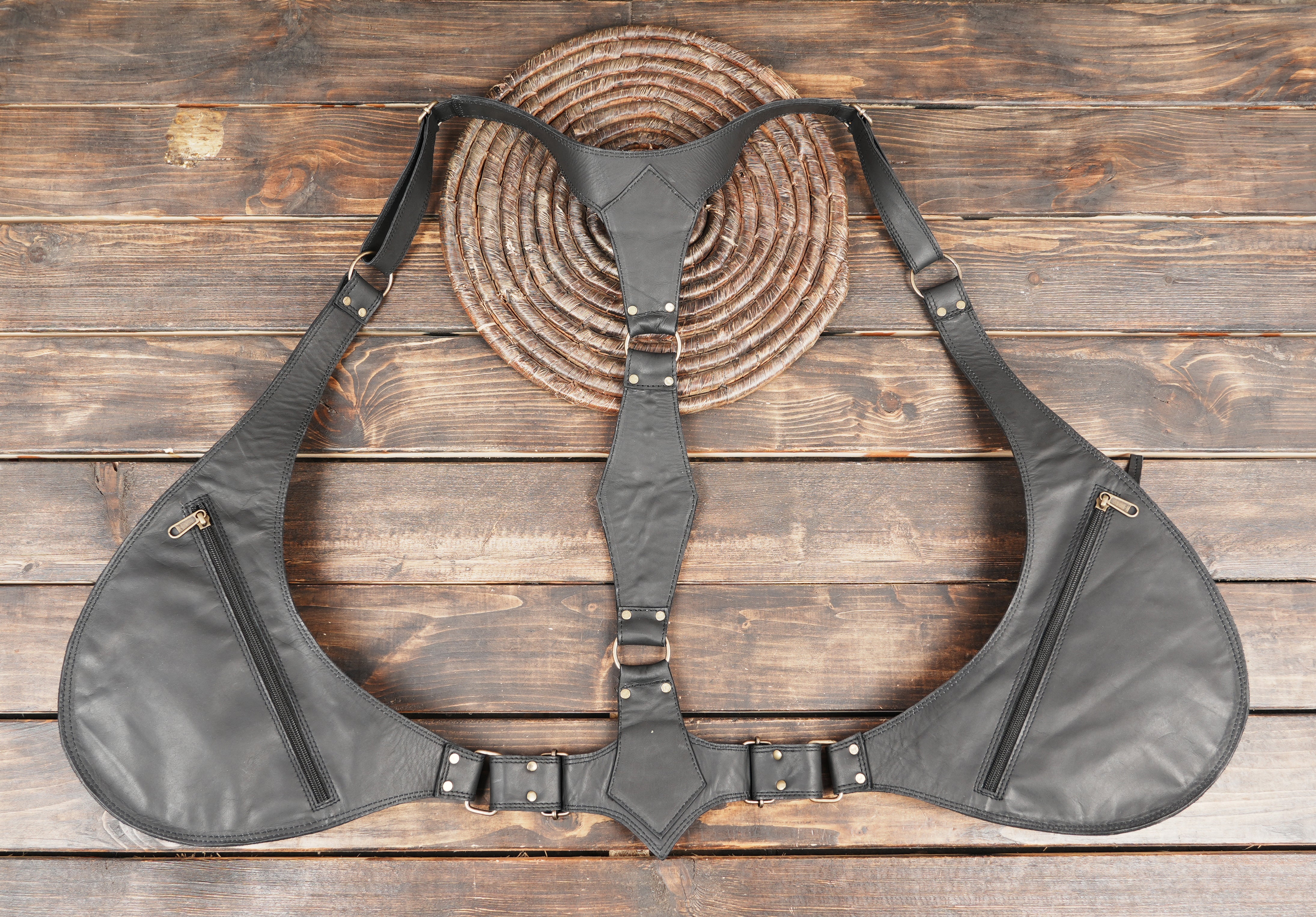 Crossbody leather holster harness with stud work and belt buckles