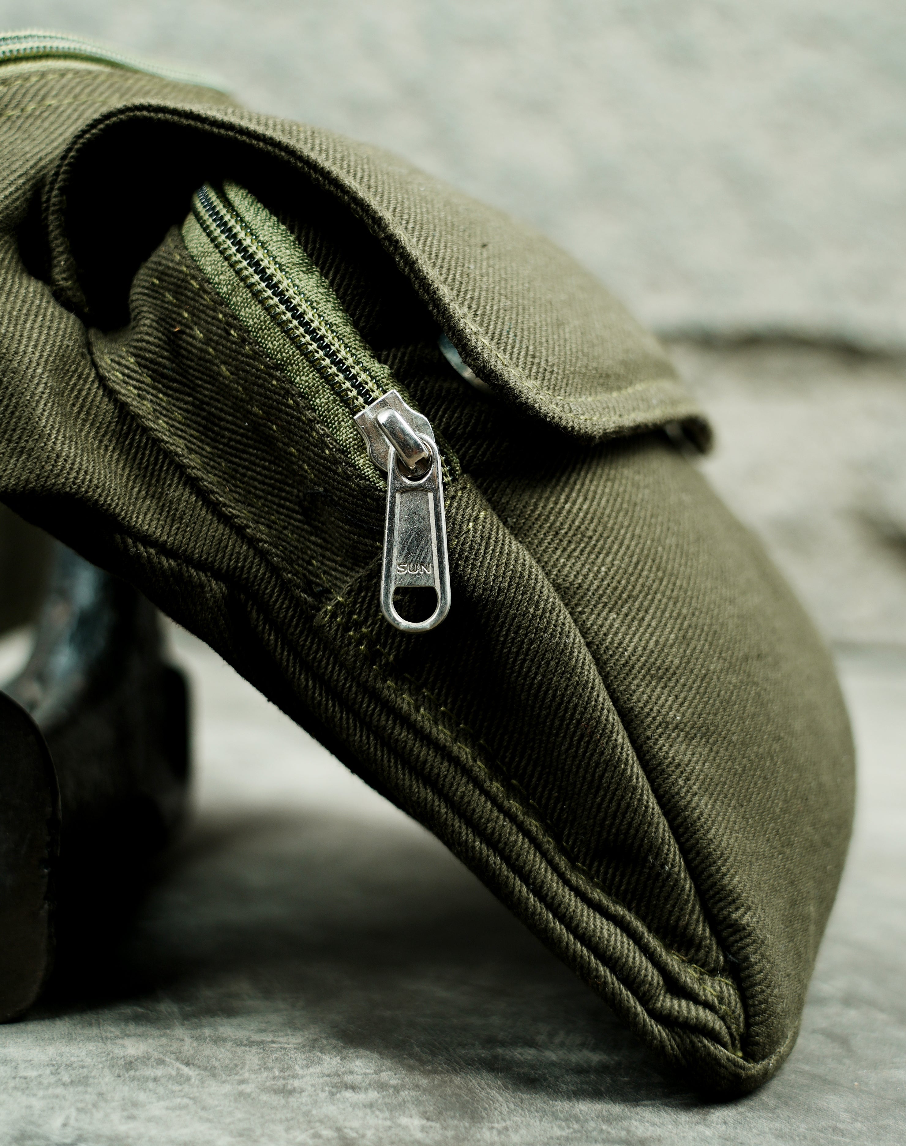 cotton belt bag with top zip pocket and front flap compartment