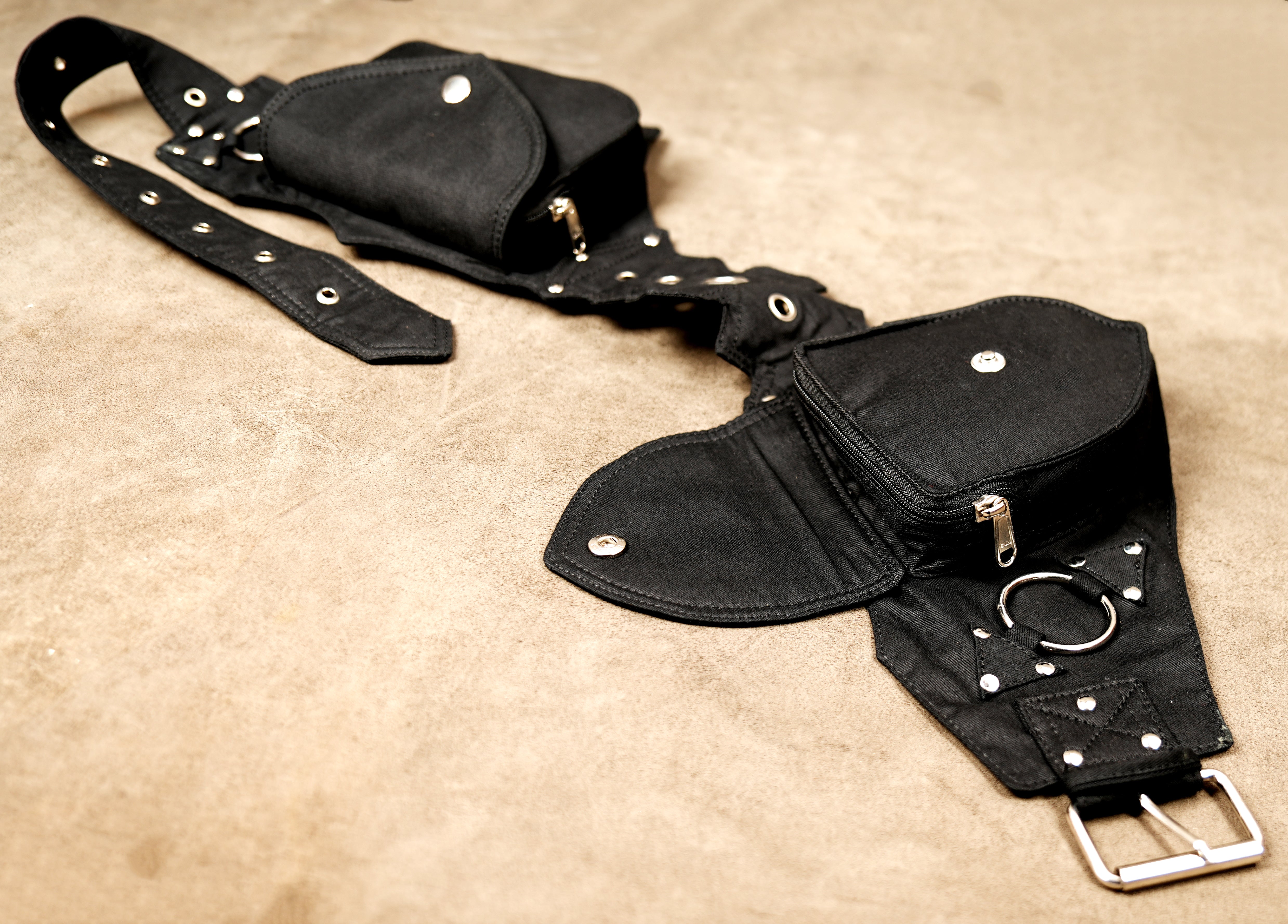 Dark alternative fashion black canvas utility belt with adjustable fit.