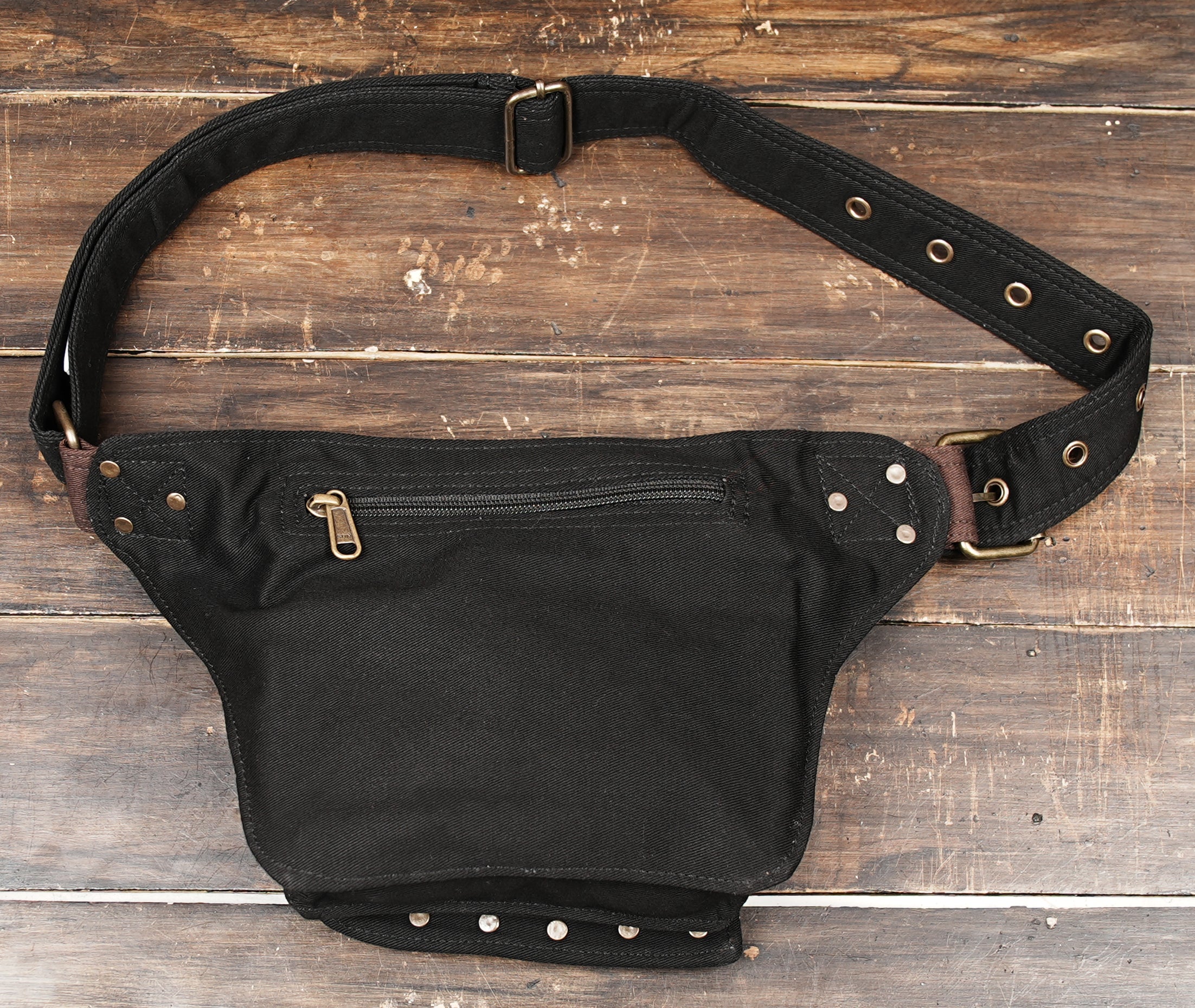 Travel-friendly canvas hip holster with front pocket