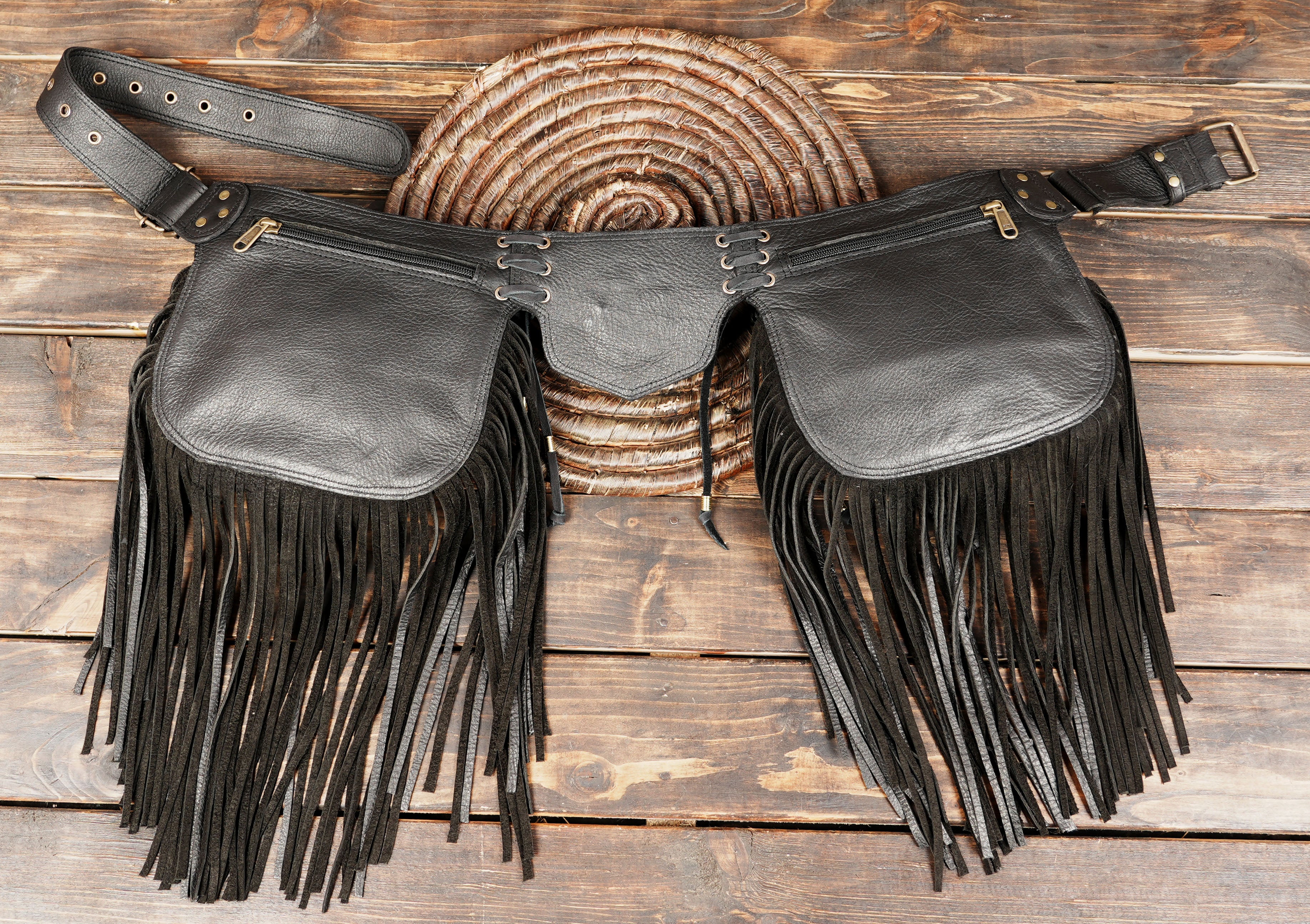 Statement leather waist belt with long black fringe and western embellishments