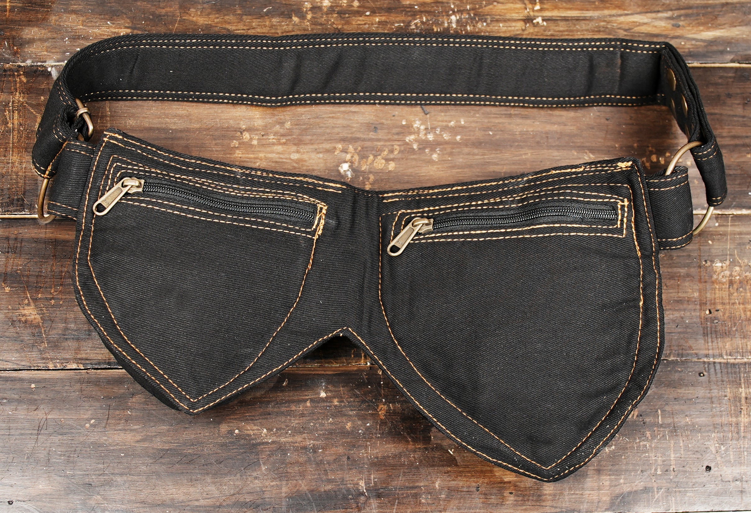 Secure waist bag for hiking and everyday use, black cotton with a strong metal clasp and large pouches.