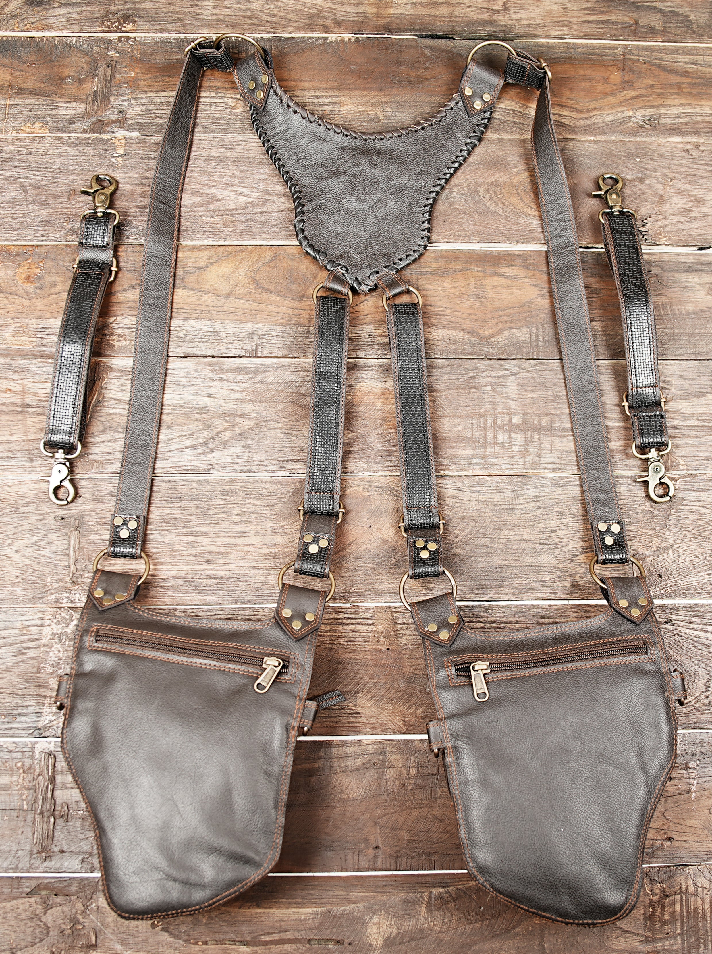 Custom leather shoulder holster with decorative hand stitching