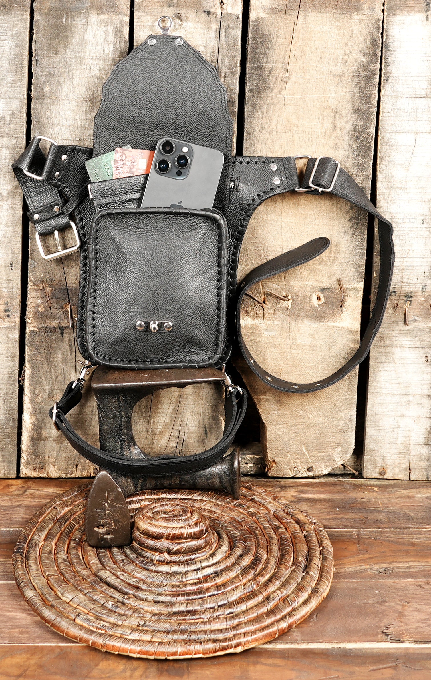 Unisex black leather thigh holster bag for festivals and bikers