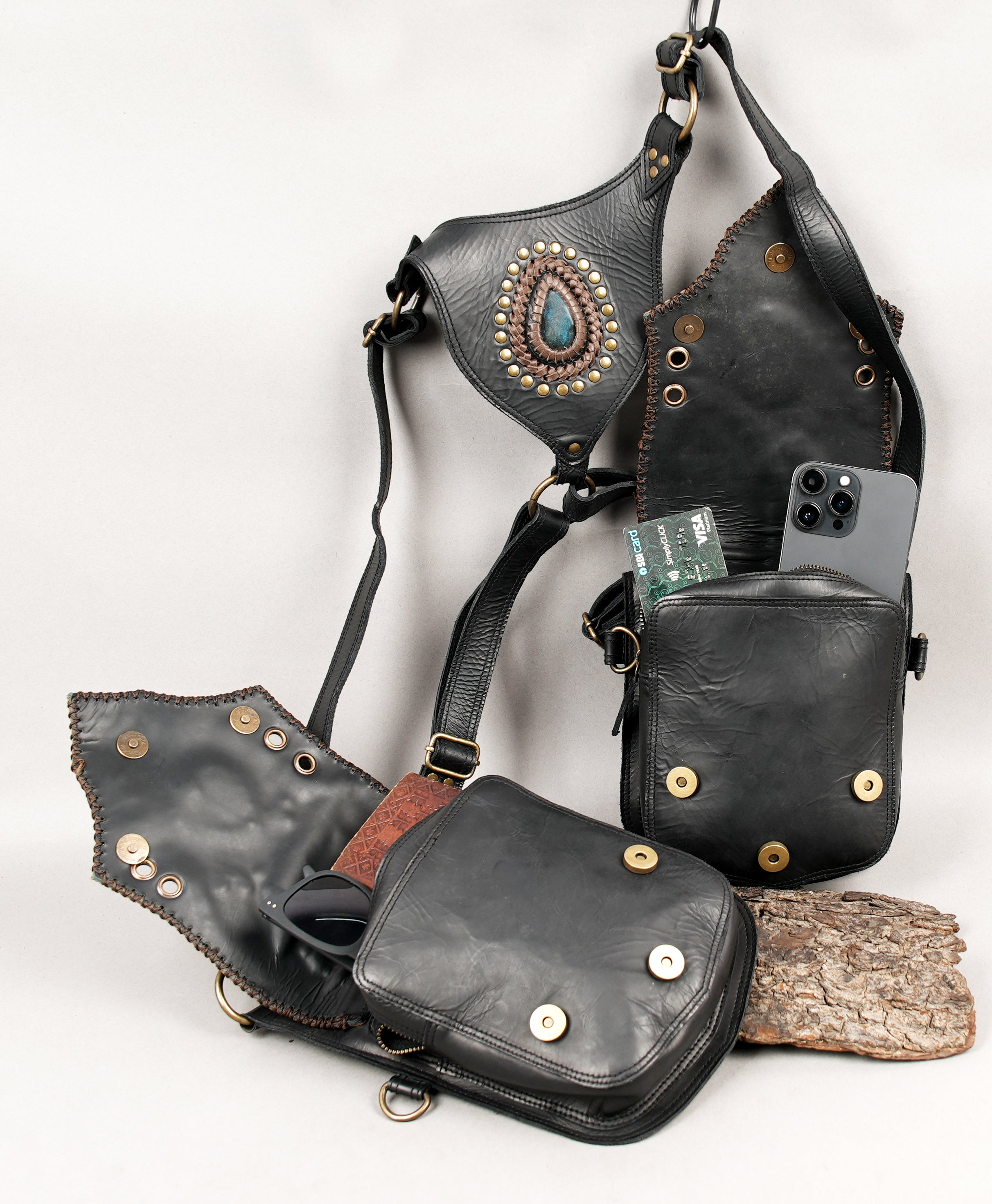 Leather utility holster with gemstone centerpiece and brass accents
