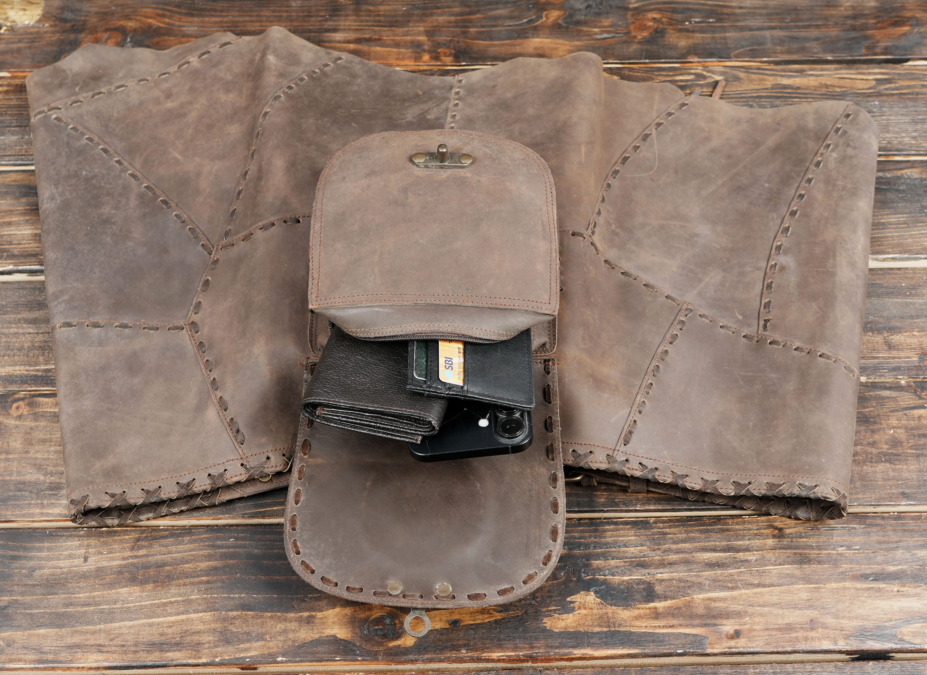 Stylish fringe accents add movement and charm to the design.