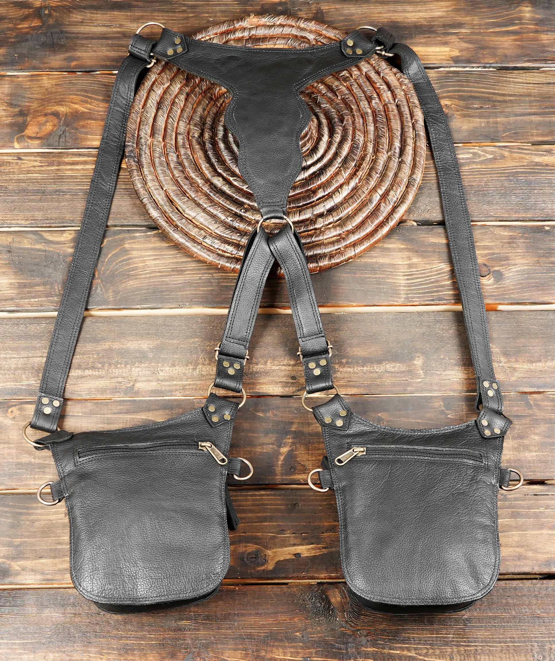 Black leather dual pouch holster with secure snap closures