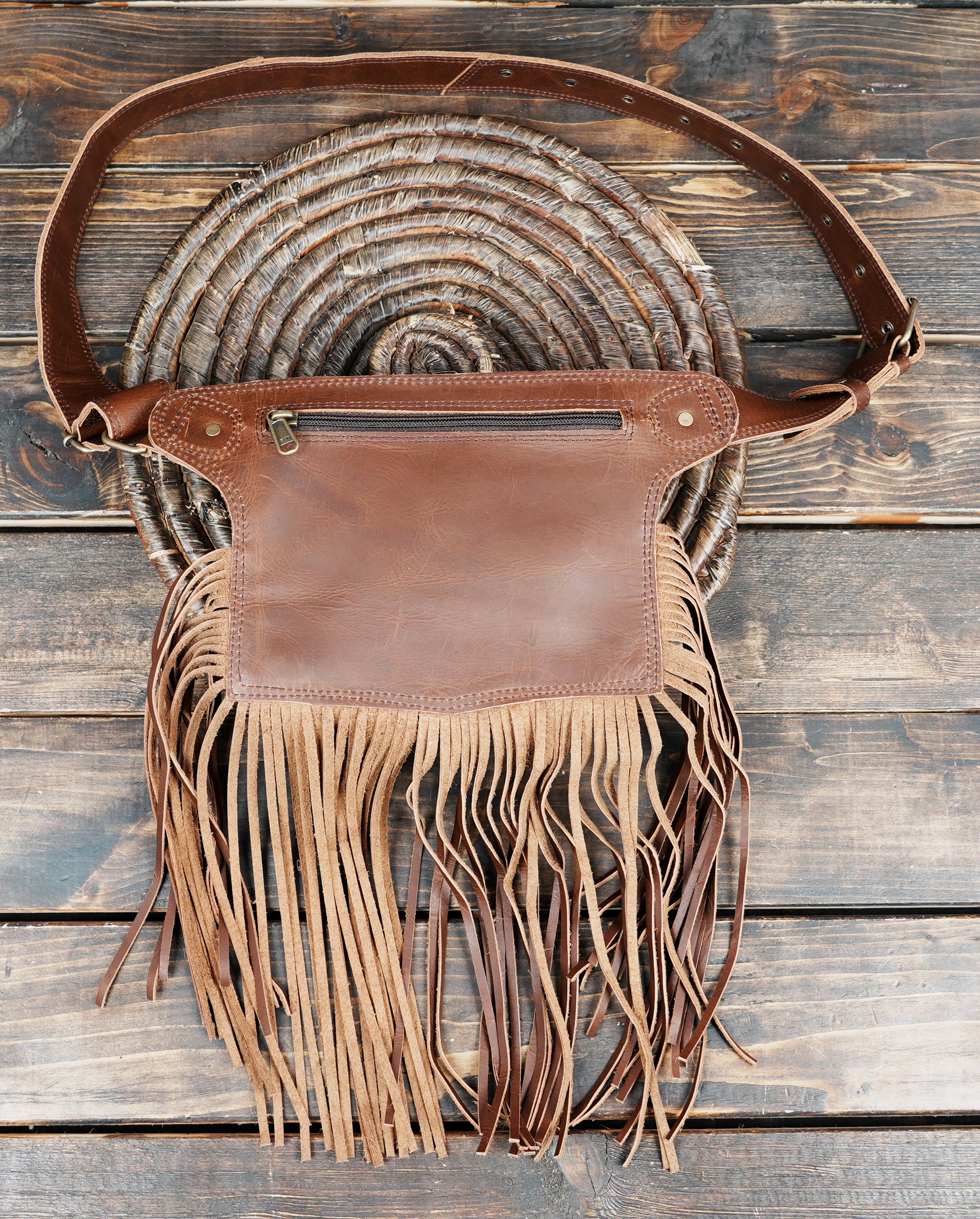 Country western leather waist belt with layered fringe trim