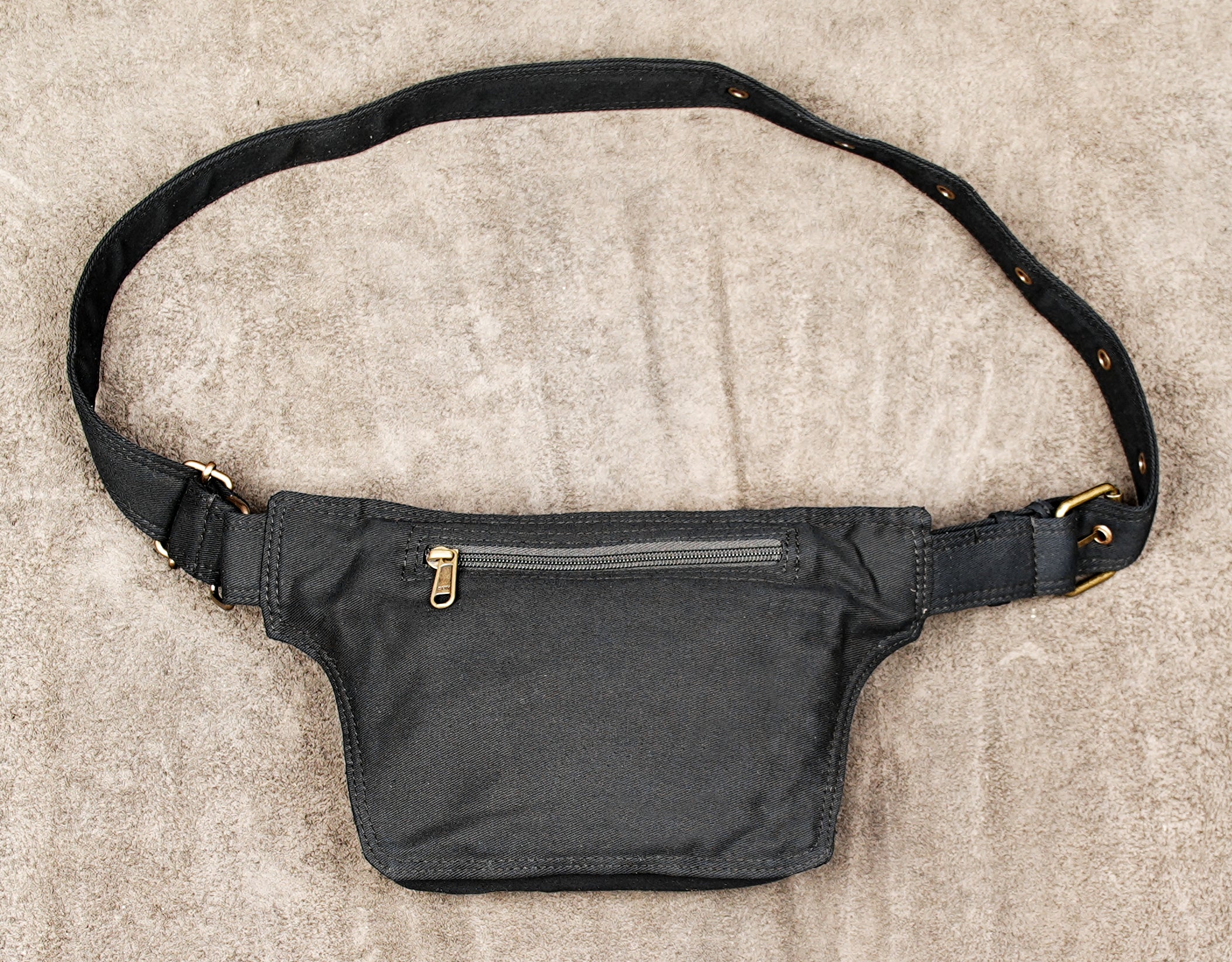 Black boho waist bag with adjustable strap and practical storage