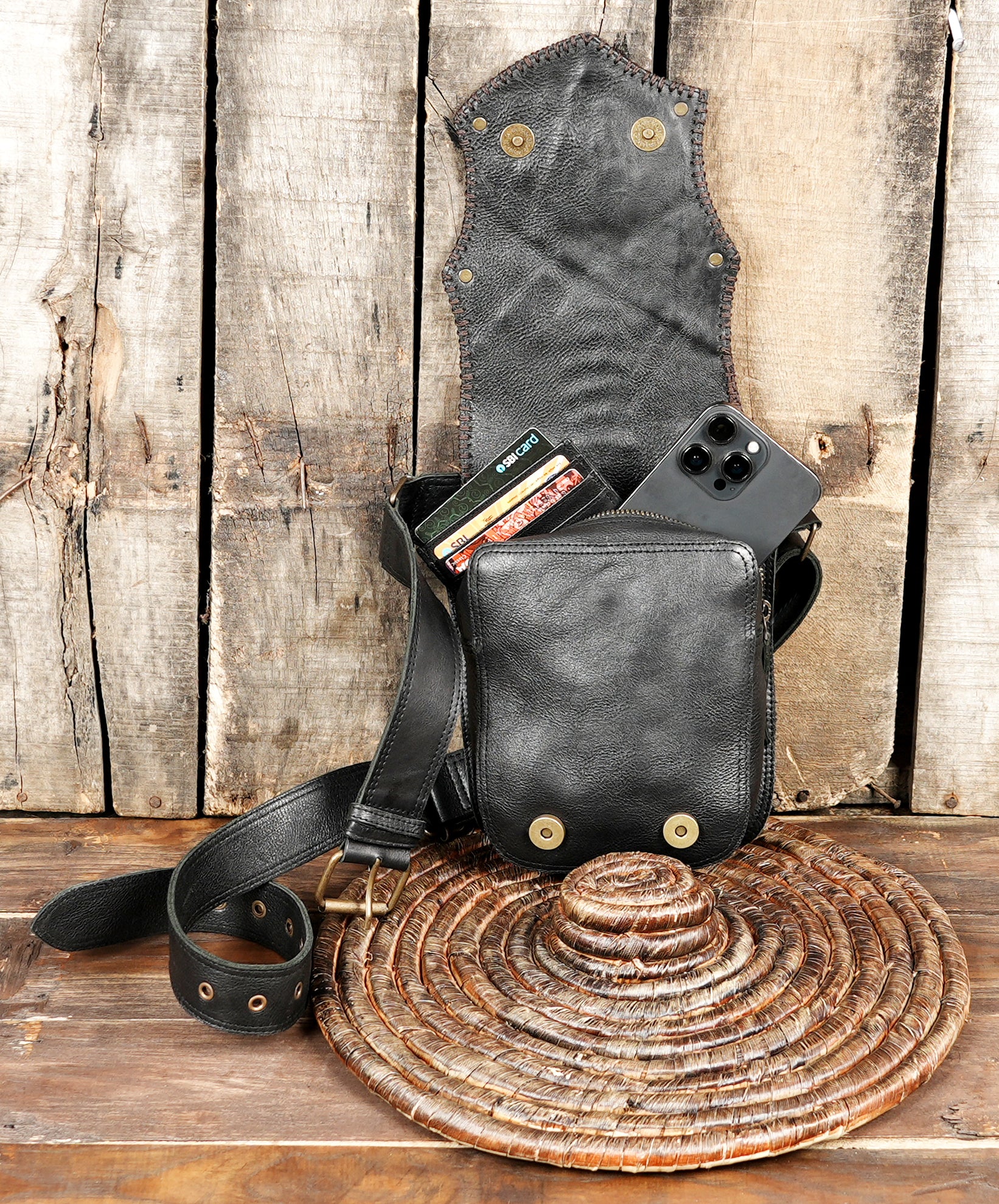 Gothic style leather waist belt with metal studs and stone accent