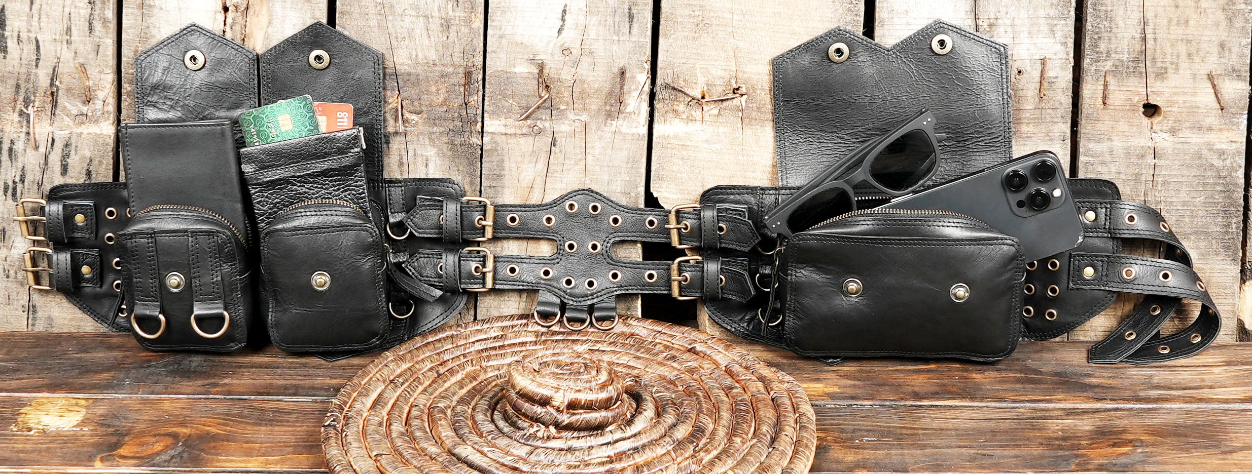 black leather hip bag with multiple compartments