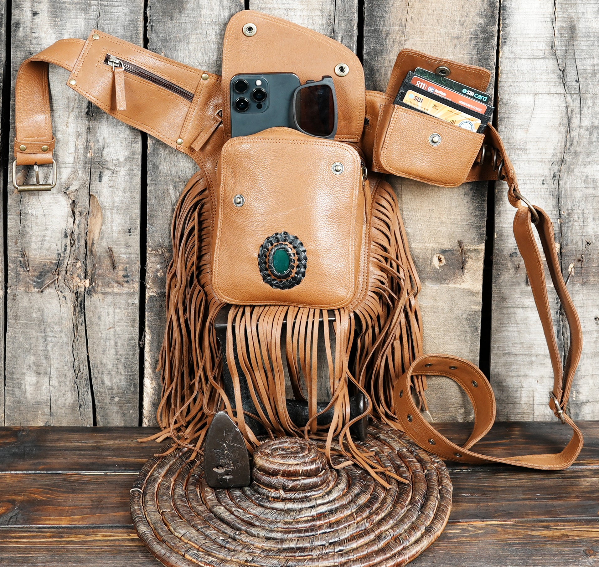 Bohemian leather hip belt with fringe and multi pocket storage