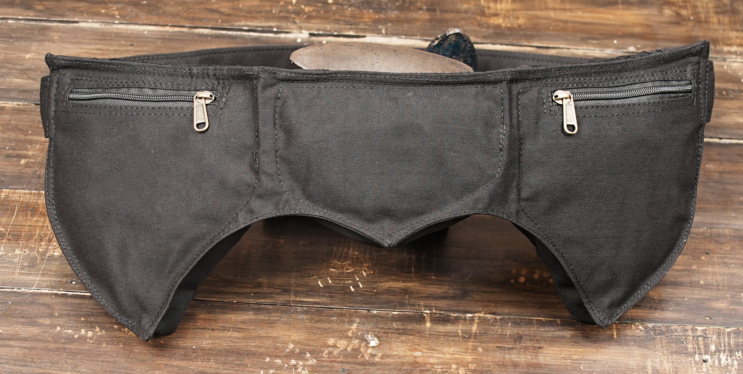 Alternative streetwear pocket belt with dark floral lace insets laid open