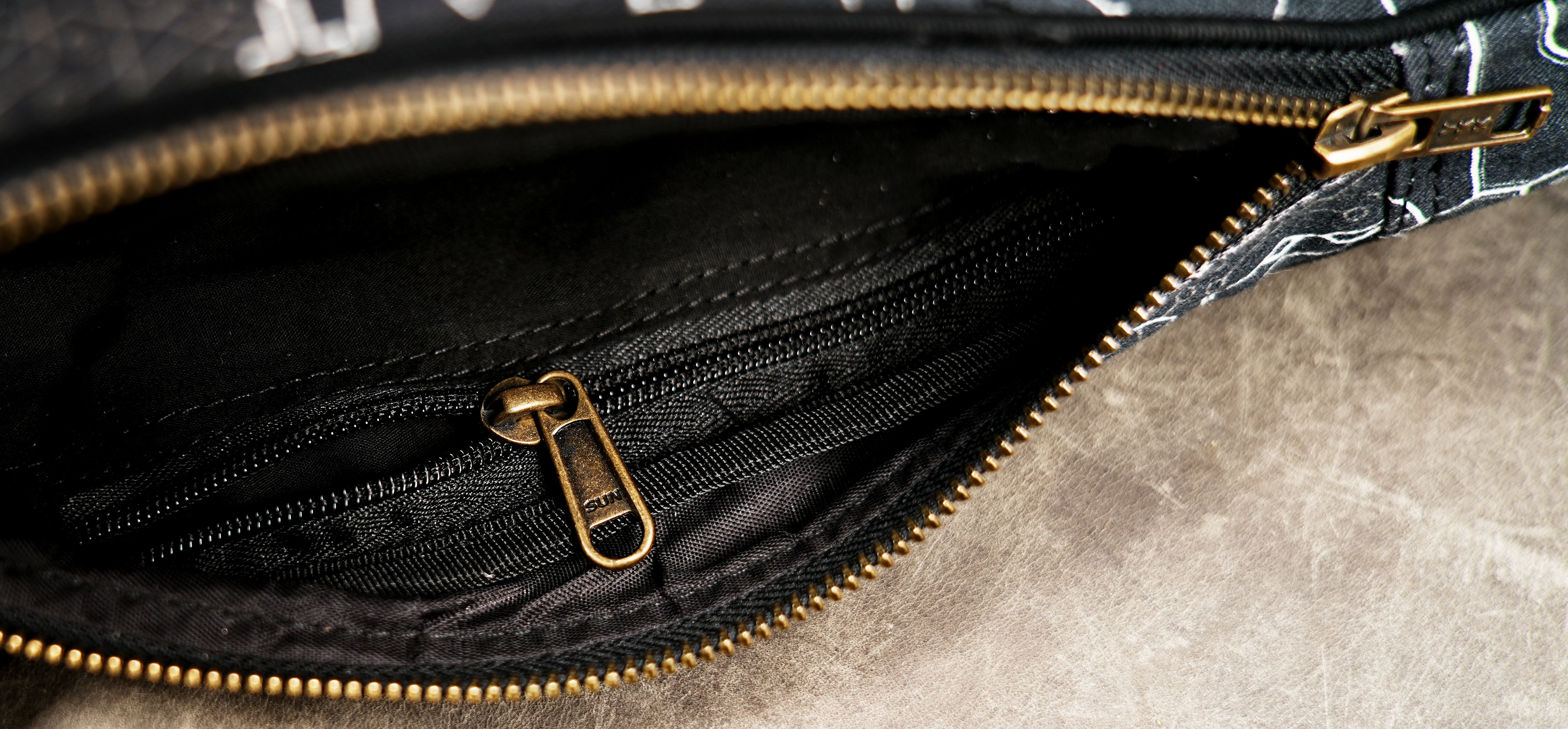 Handmade chest bag with printed circuit pattern and zip pockets
