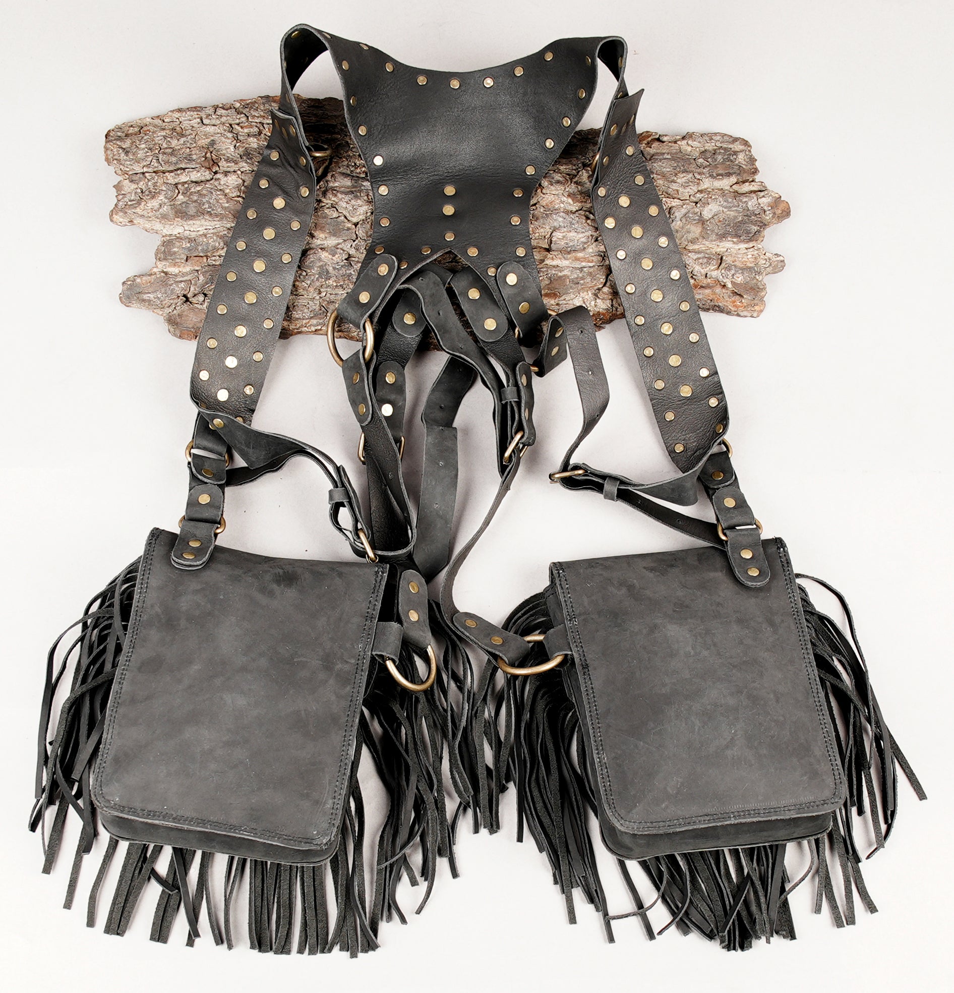 Alternative fashion leather holster with fringe finish