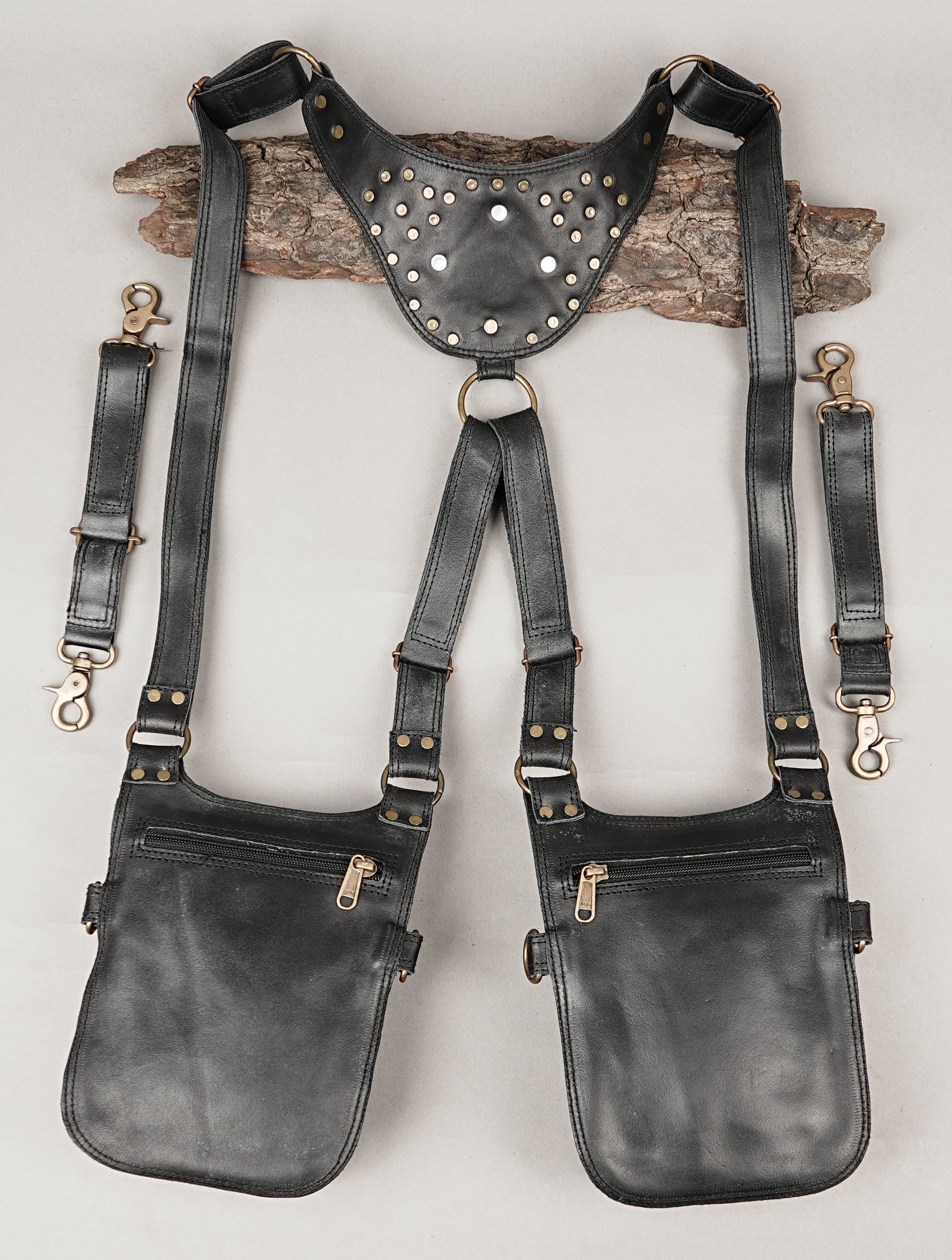Steampunk inspired leather holster with ornate detailing