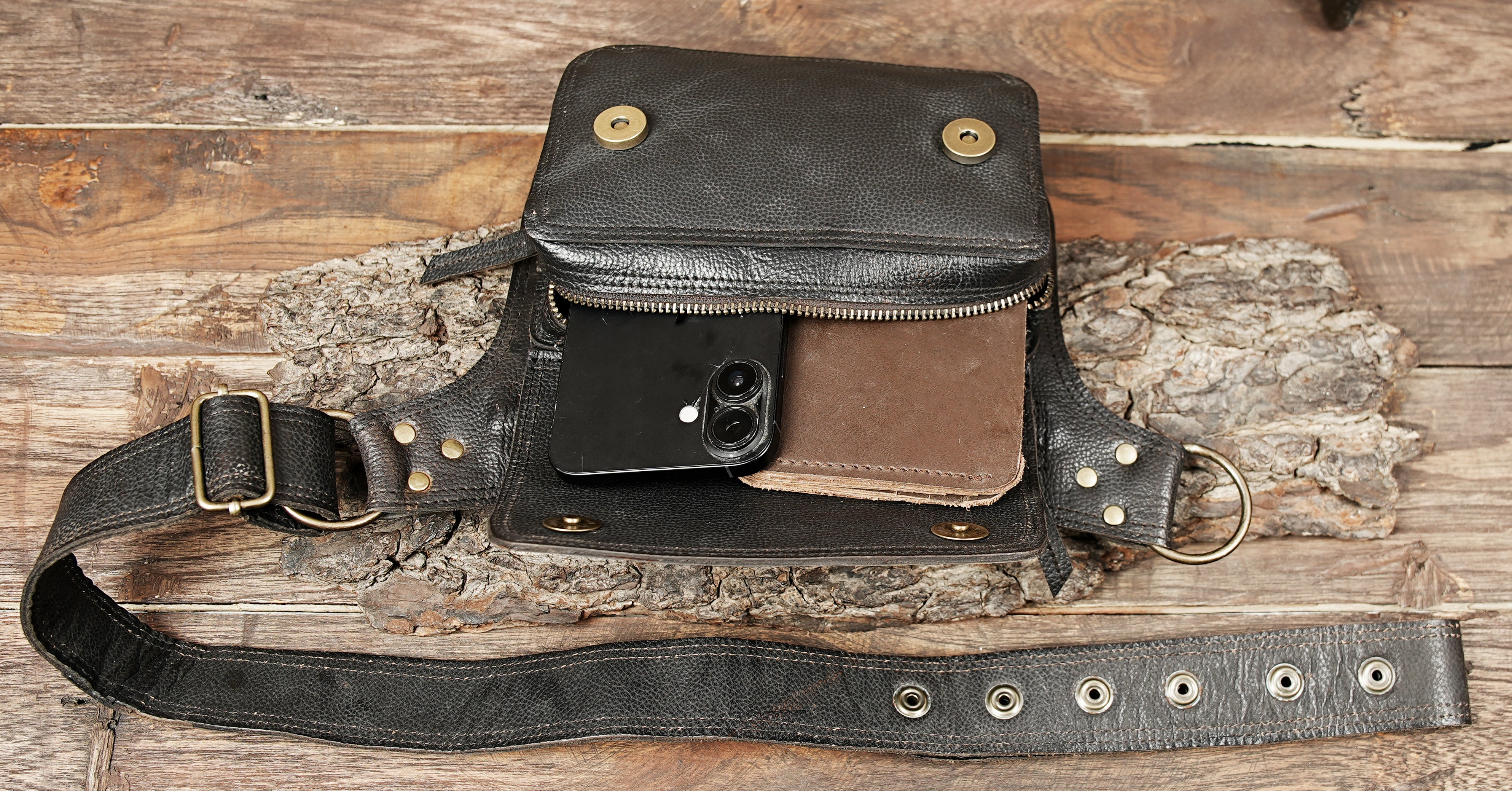 Black leather waist pouch worn by male mannequin