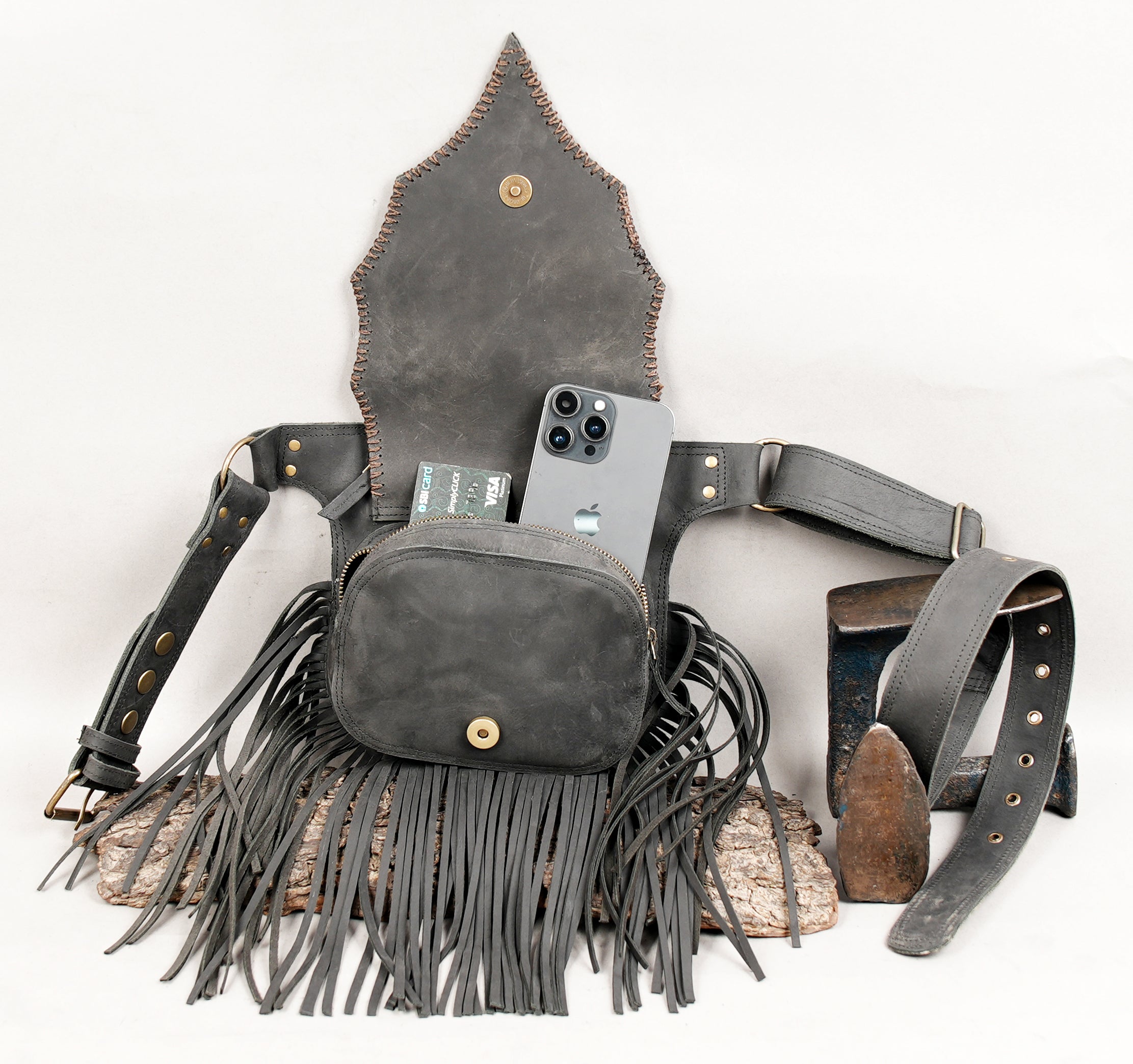 Fringe leather festival belt with gemstone embellishment and studs.