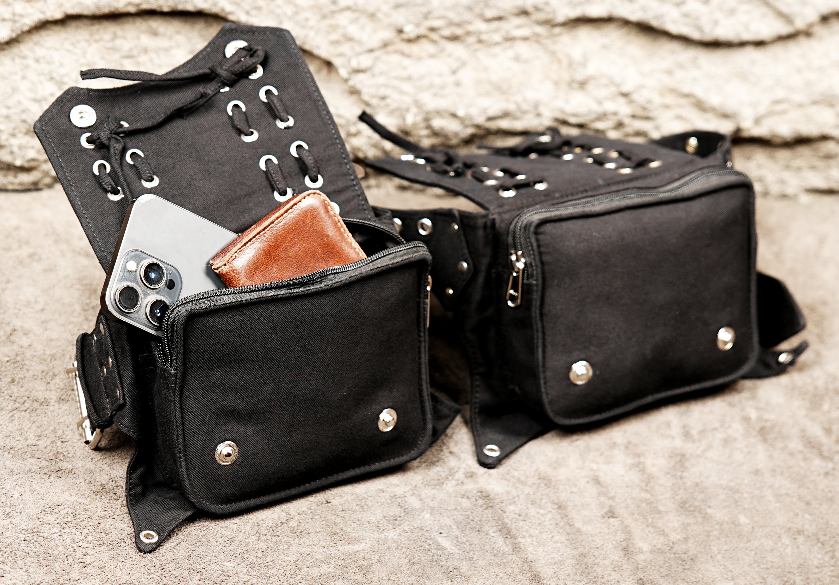 Hands-free travel organizer belt in black canvas with secure pockets for essentials.