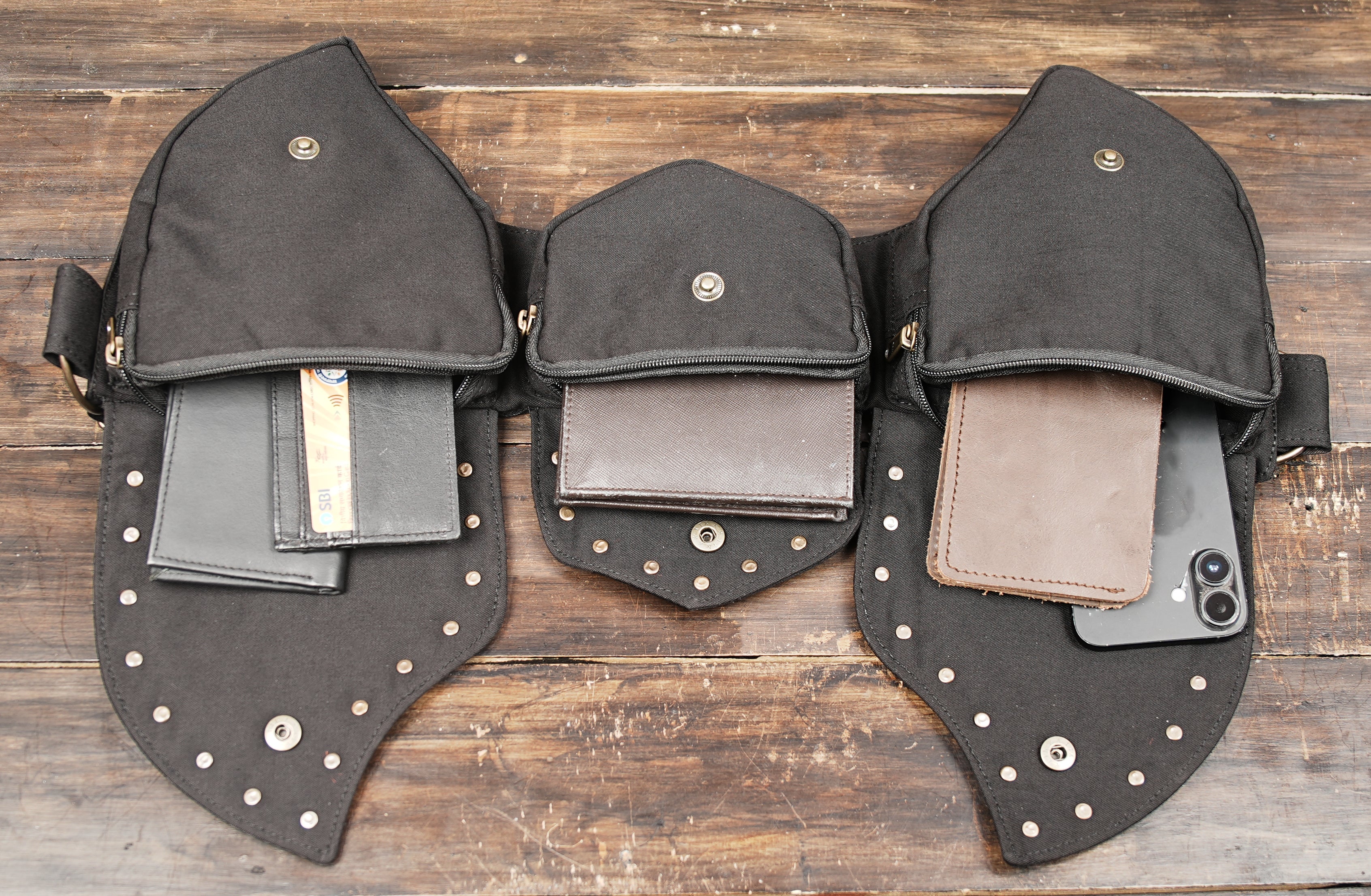 Unisex canvas hip pouch with adjustable brass buckle and multi-row eyelets