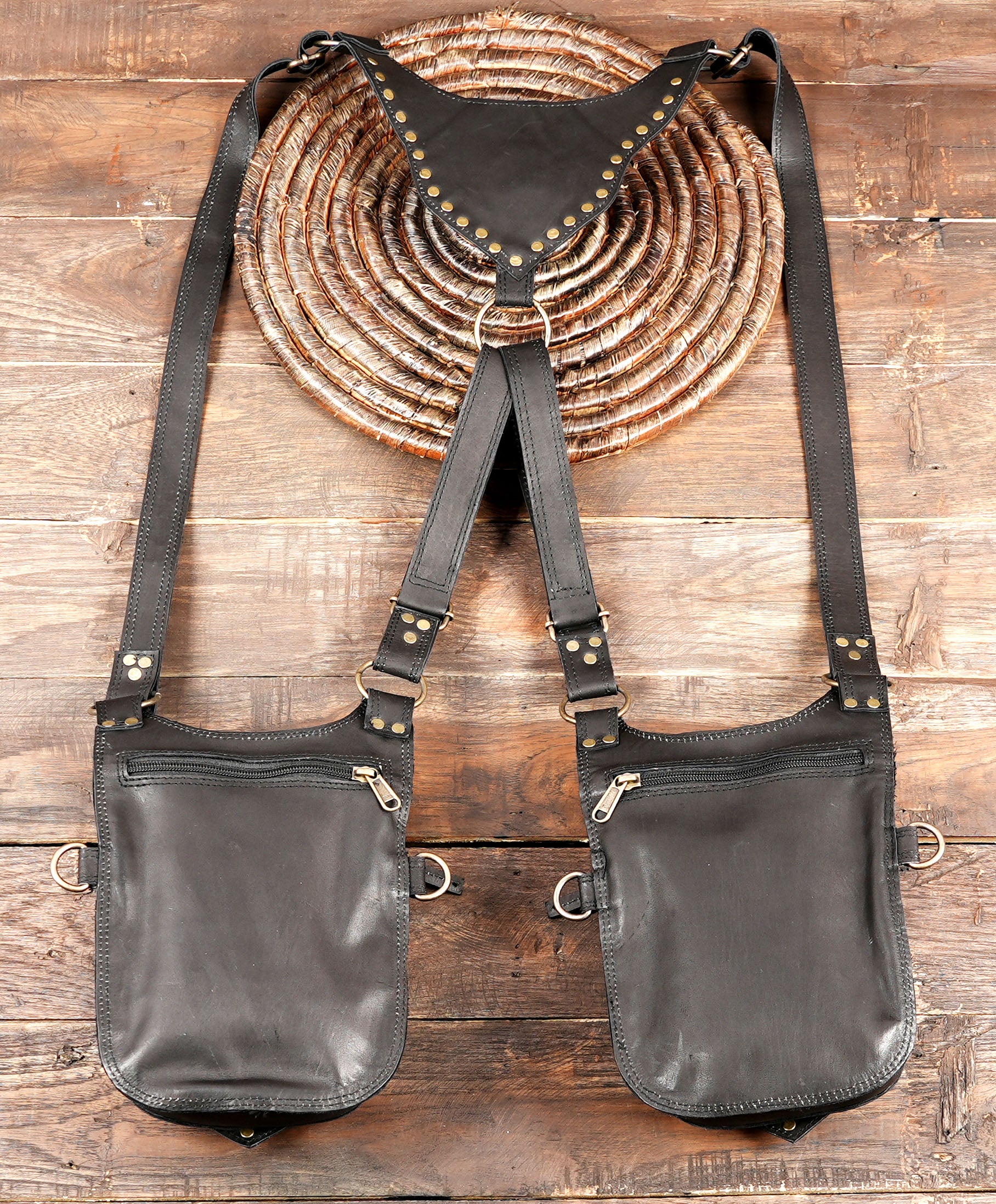 Adjustable leather shoulder bag with gemstone and brass studs