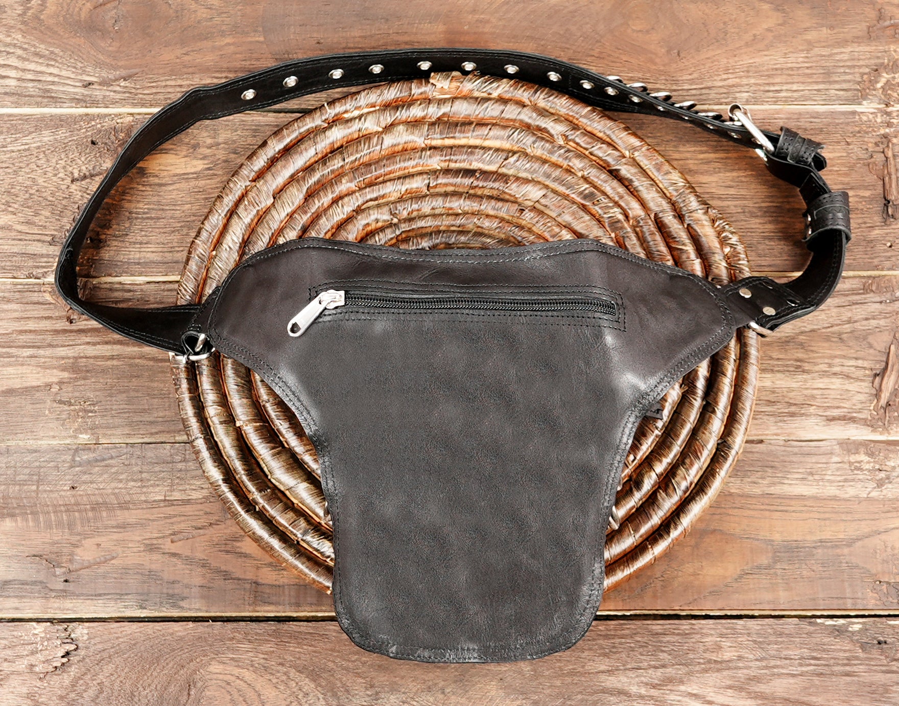 Black leather waist belt with textured leather panels