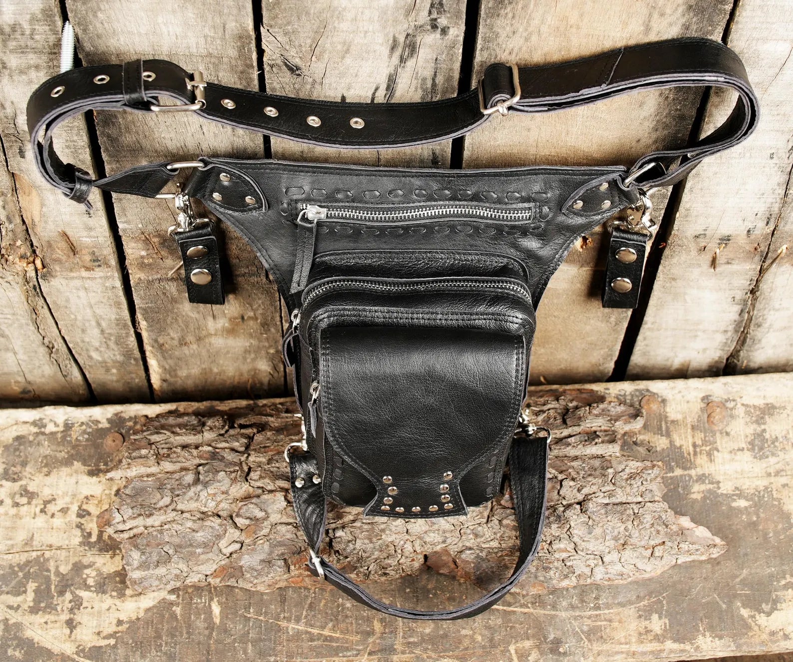 Black Leather Motorcycle Leg Bag with Studded Pocket and Adjustable Strap