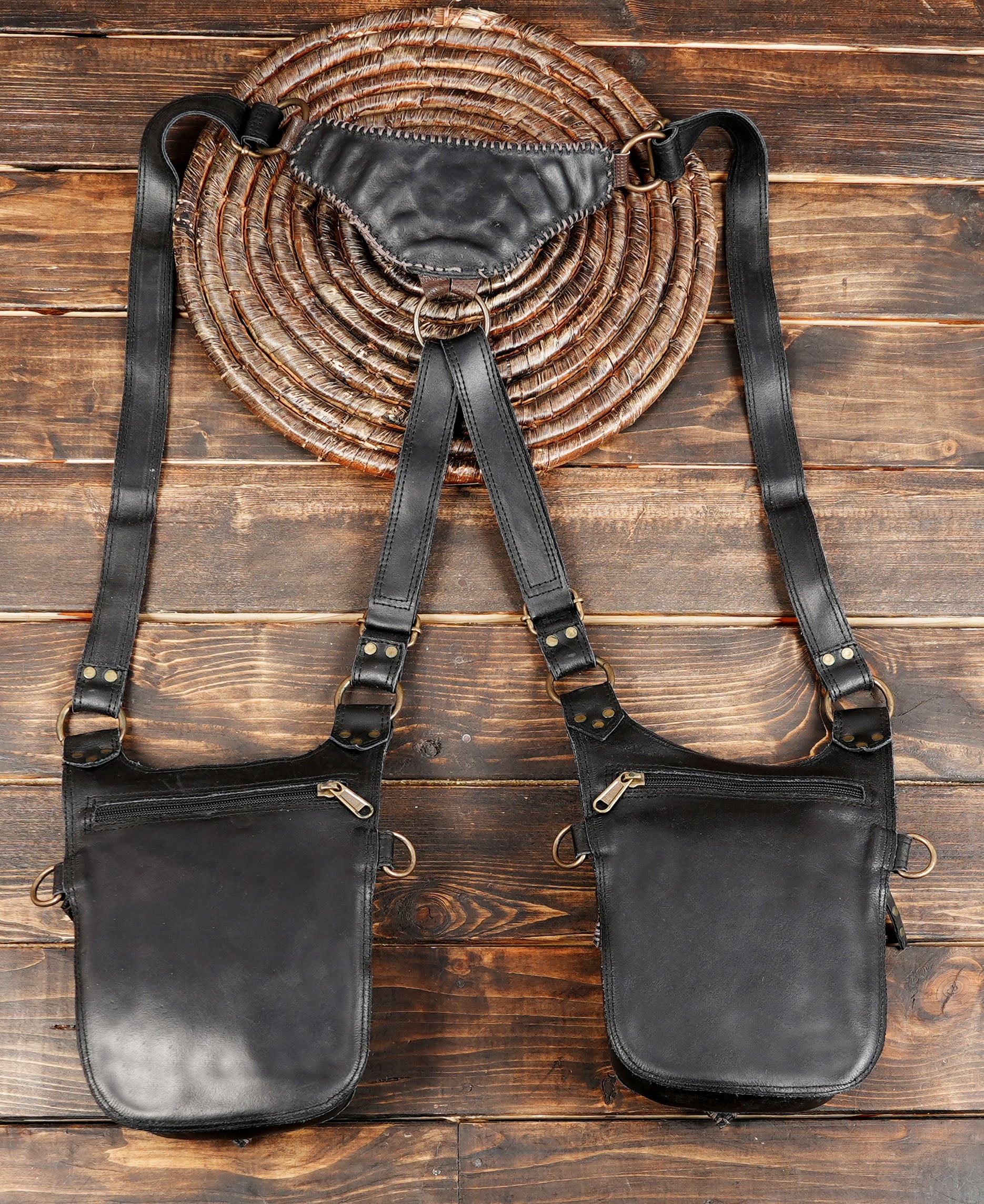 Adjustable leather harness bag with secure straps