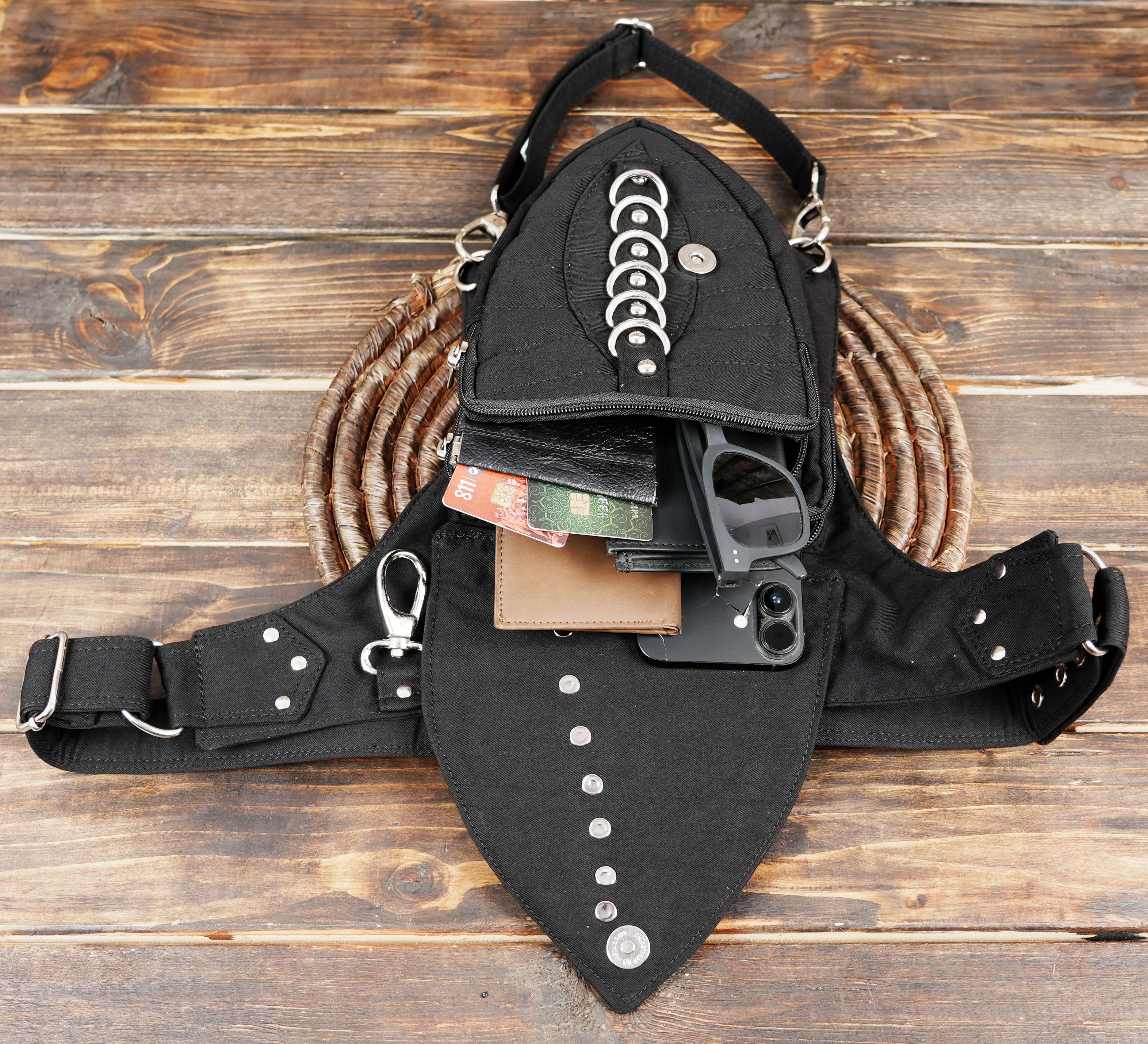 Black cotton combat thigh rig bag with zippered compartments.
