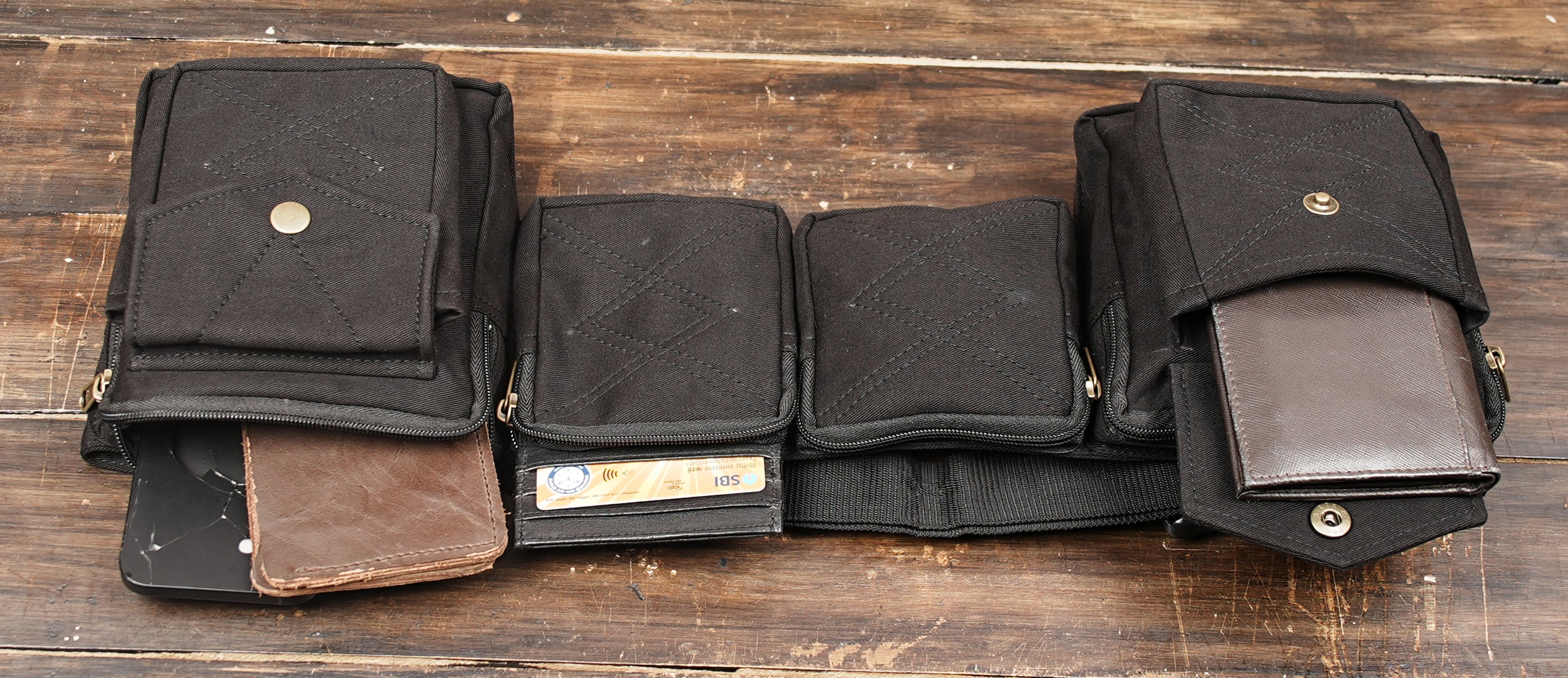 Boho style utility waist pack in black cotton with secure pocket design