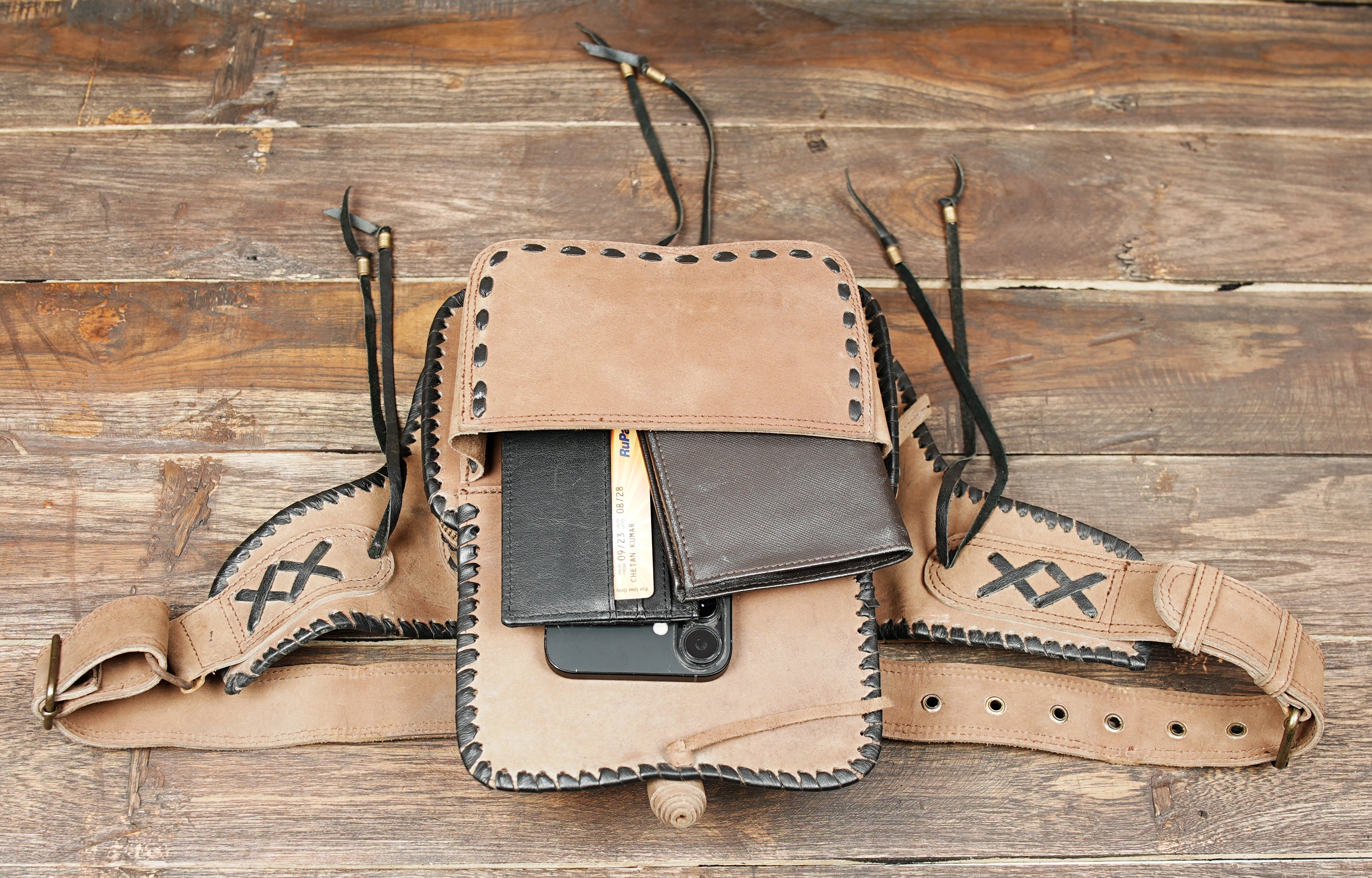 Adjustable leather waist belt with front storage pocket