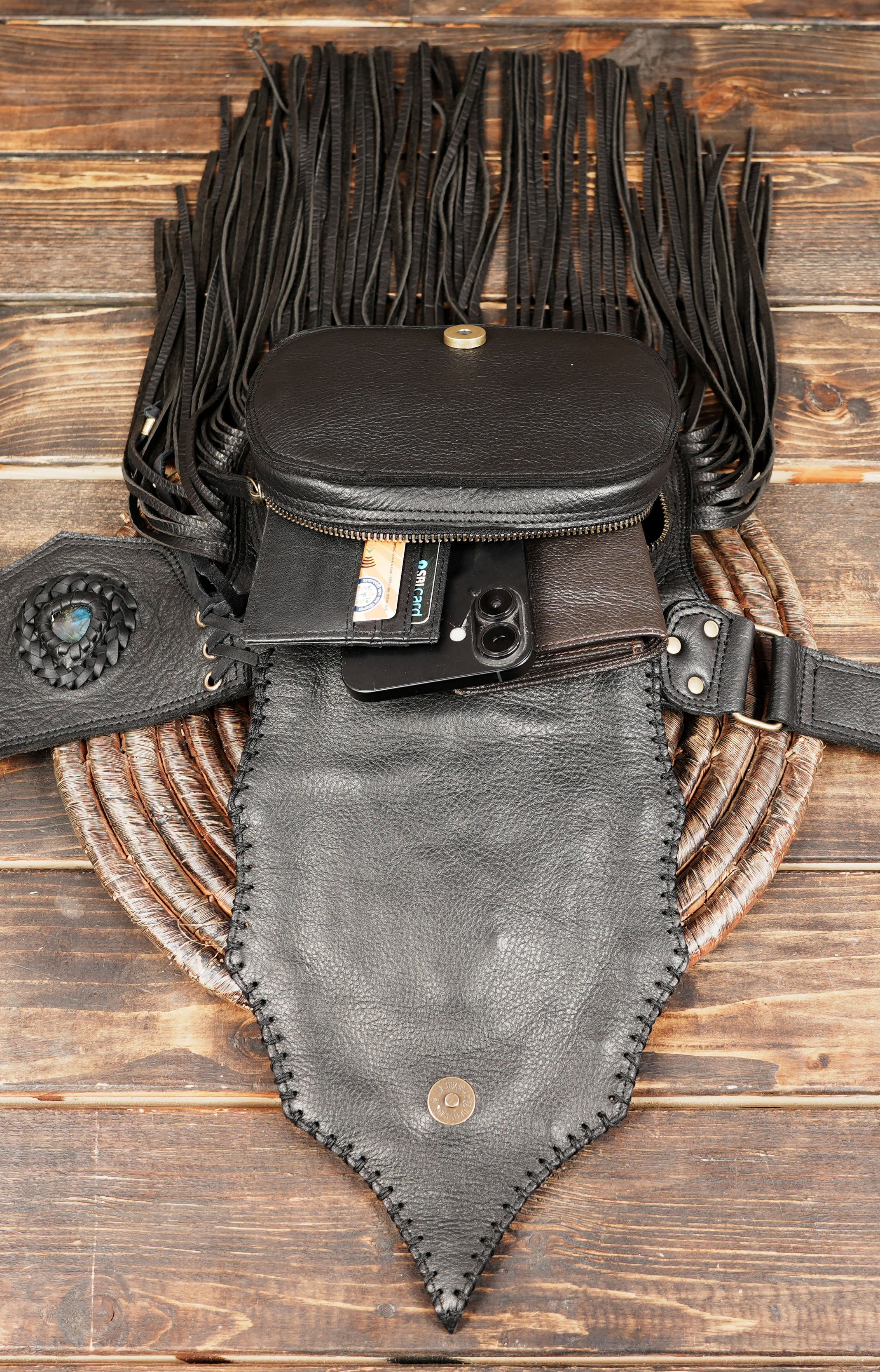 Western bohemian leather belt worn at the waist with dramatic fringe design