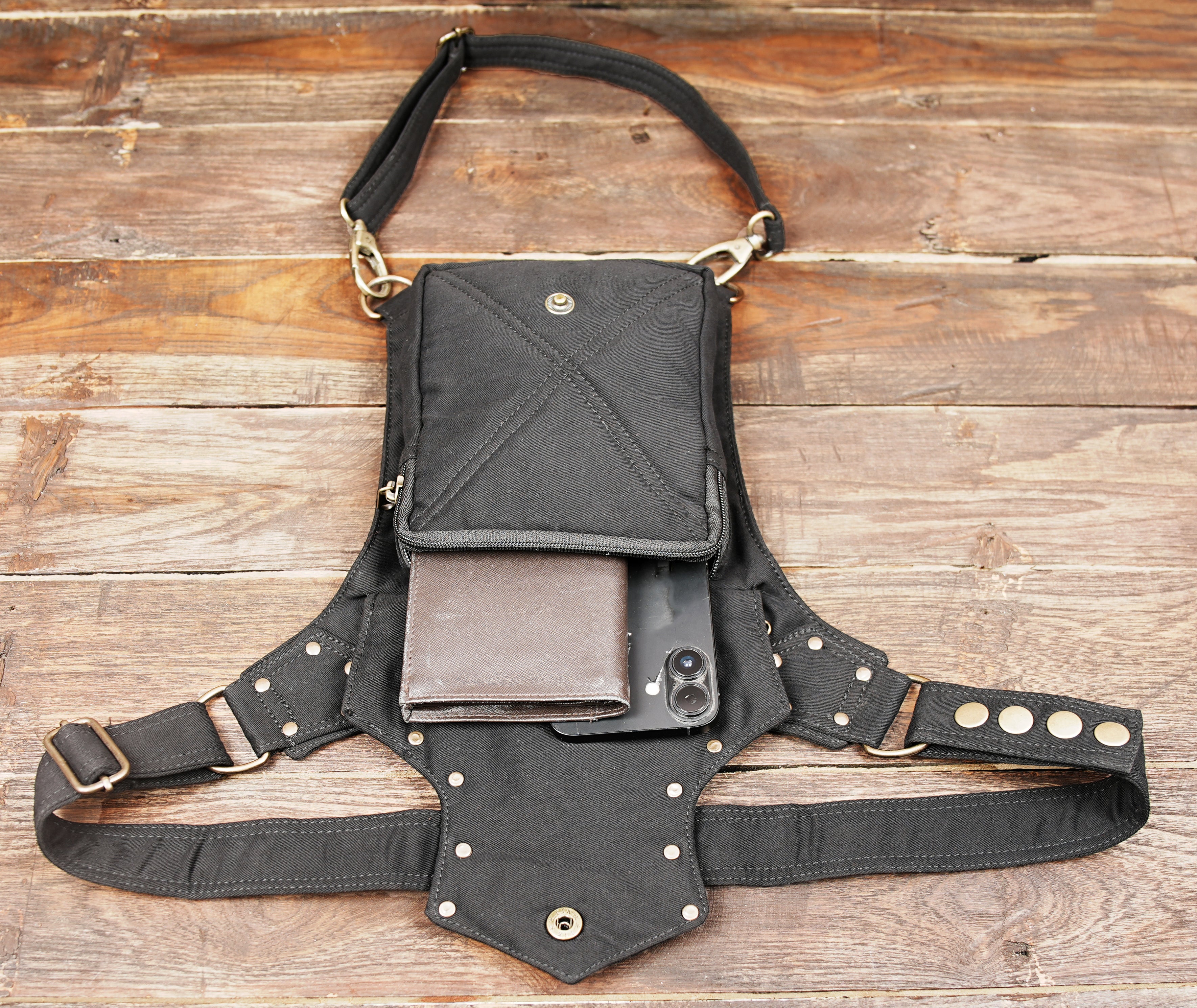 Gothic cyberpunk canvas waist pack with metal D-rings and adjustable thigh strap.