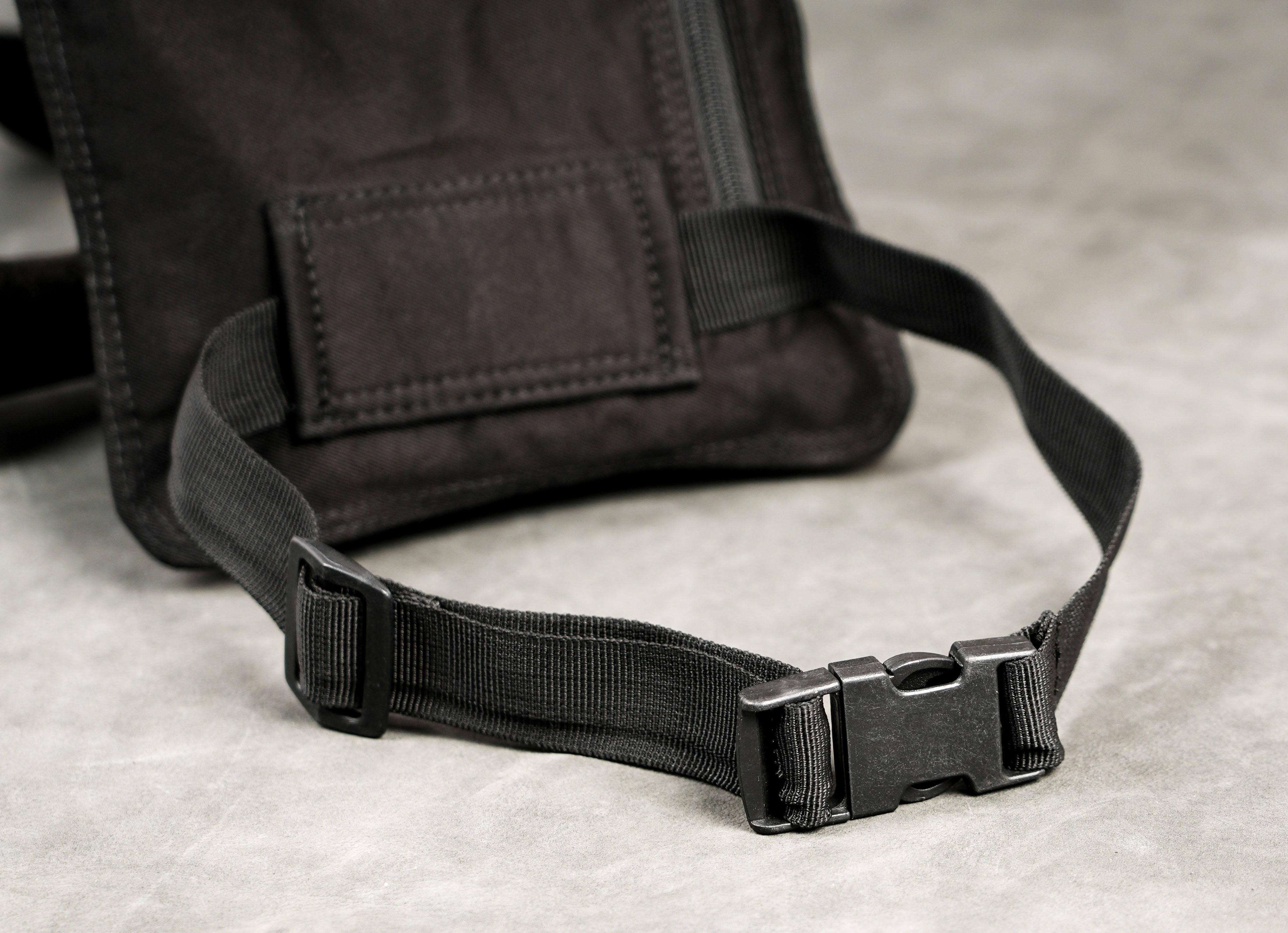 Handmade black cotton leg bag with snap button flap