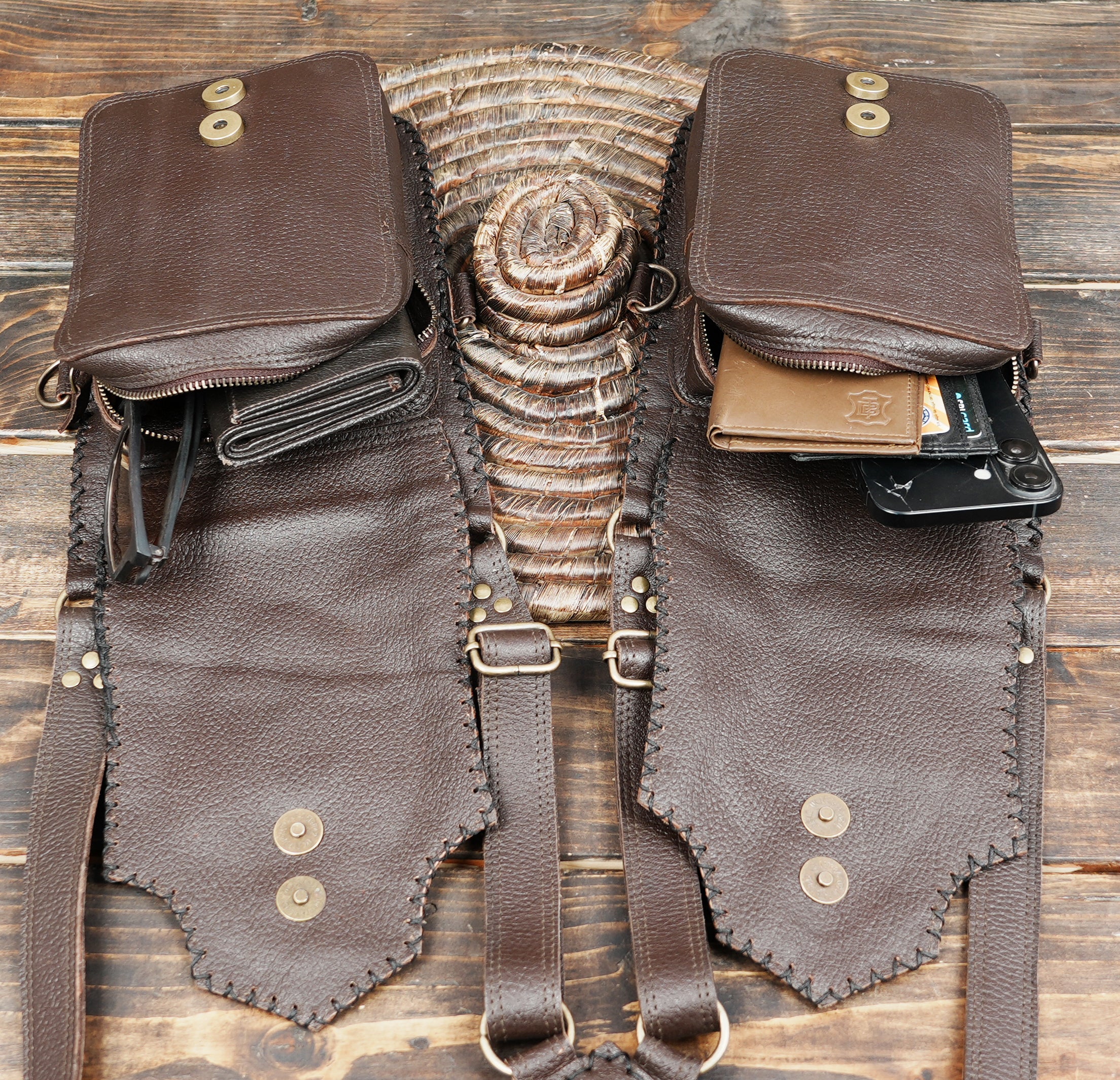 Rustic adventure style leather shoulder holster with decorative stitching