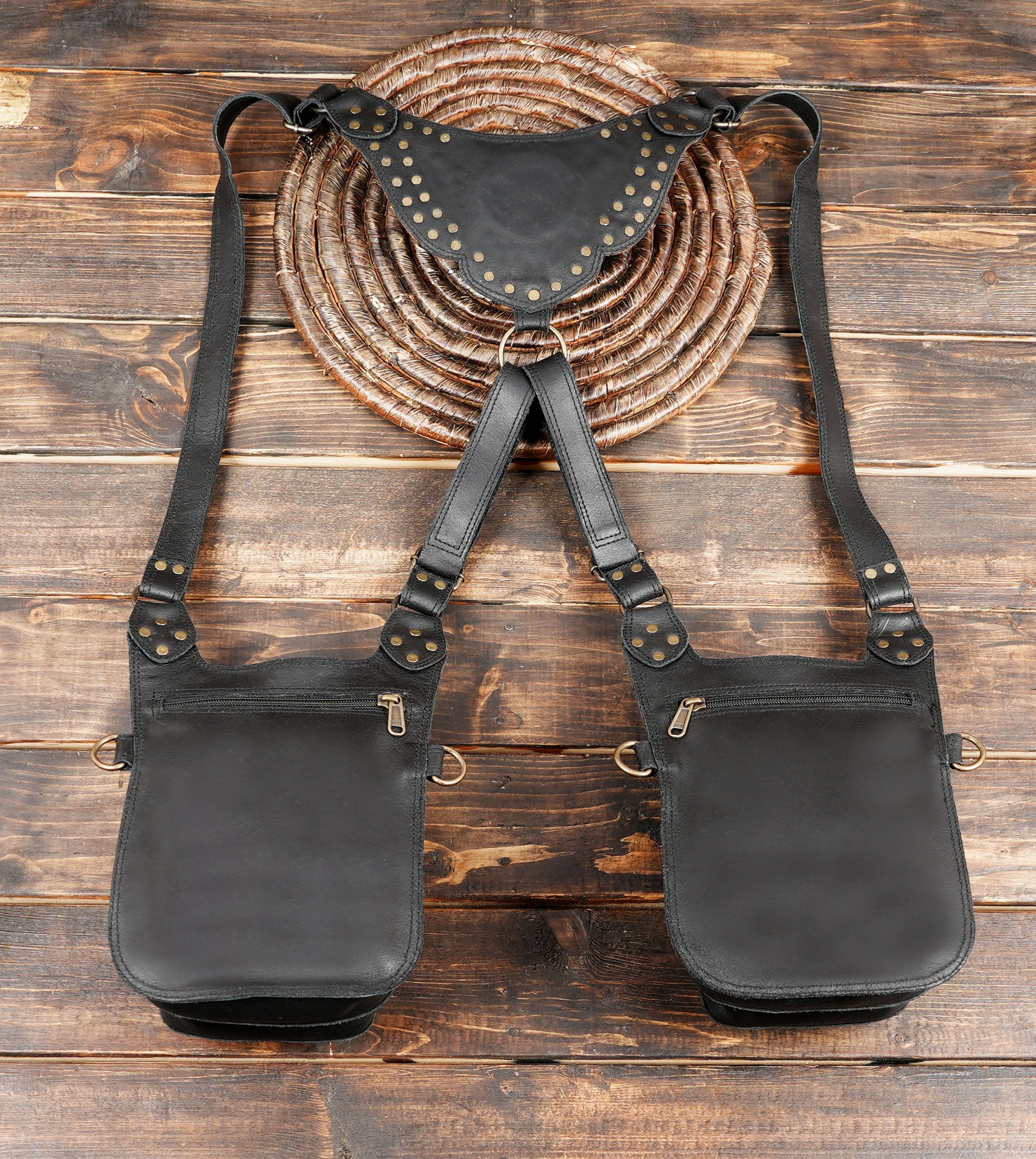“Black utility holster for festivals with ornate gemstone design and dual functional pockets”