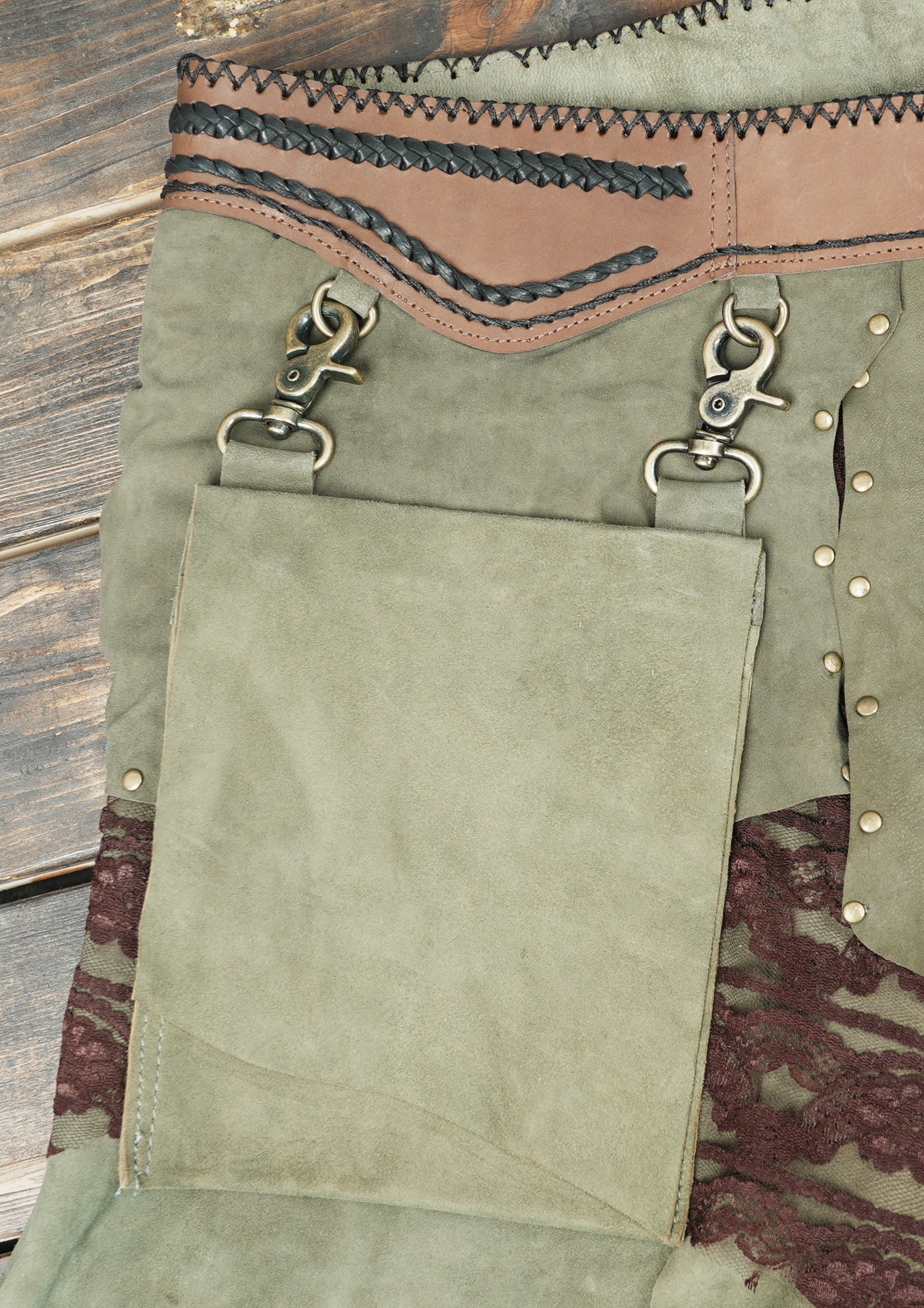 Medieval-inspired suede skirt with gemstone decor