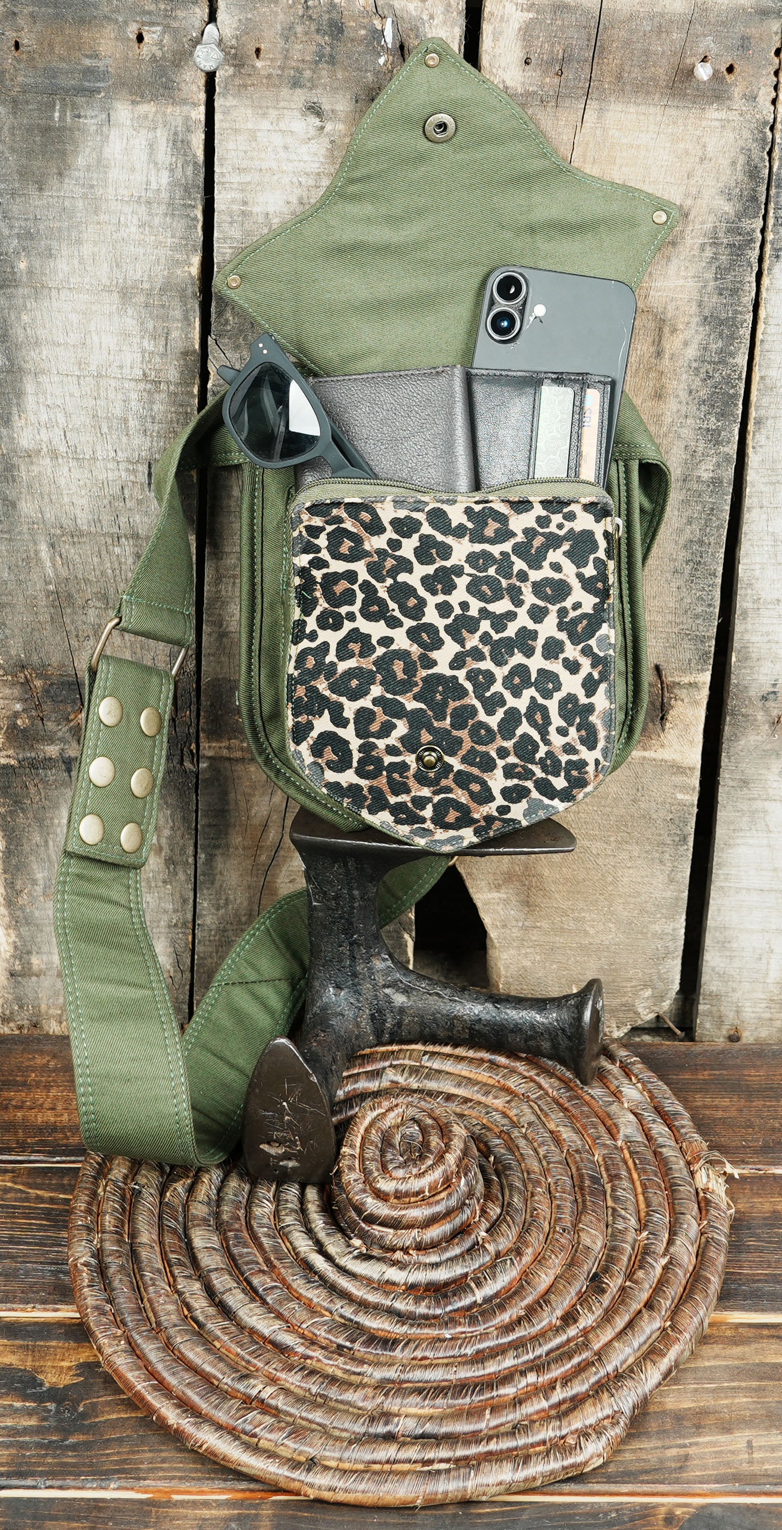 Versatile olive green gear belt with a creative leaf flap and secure storage