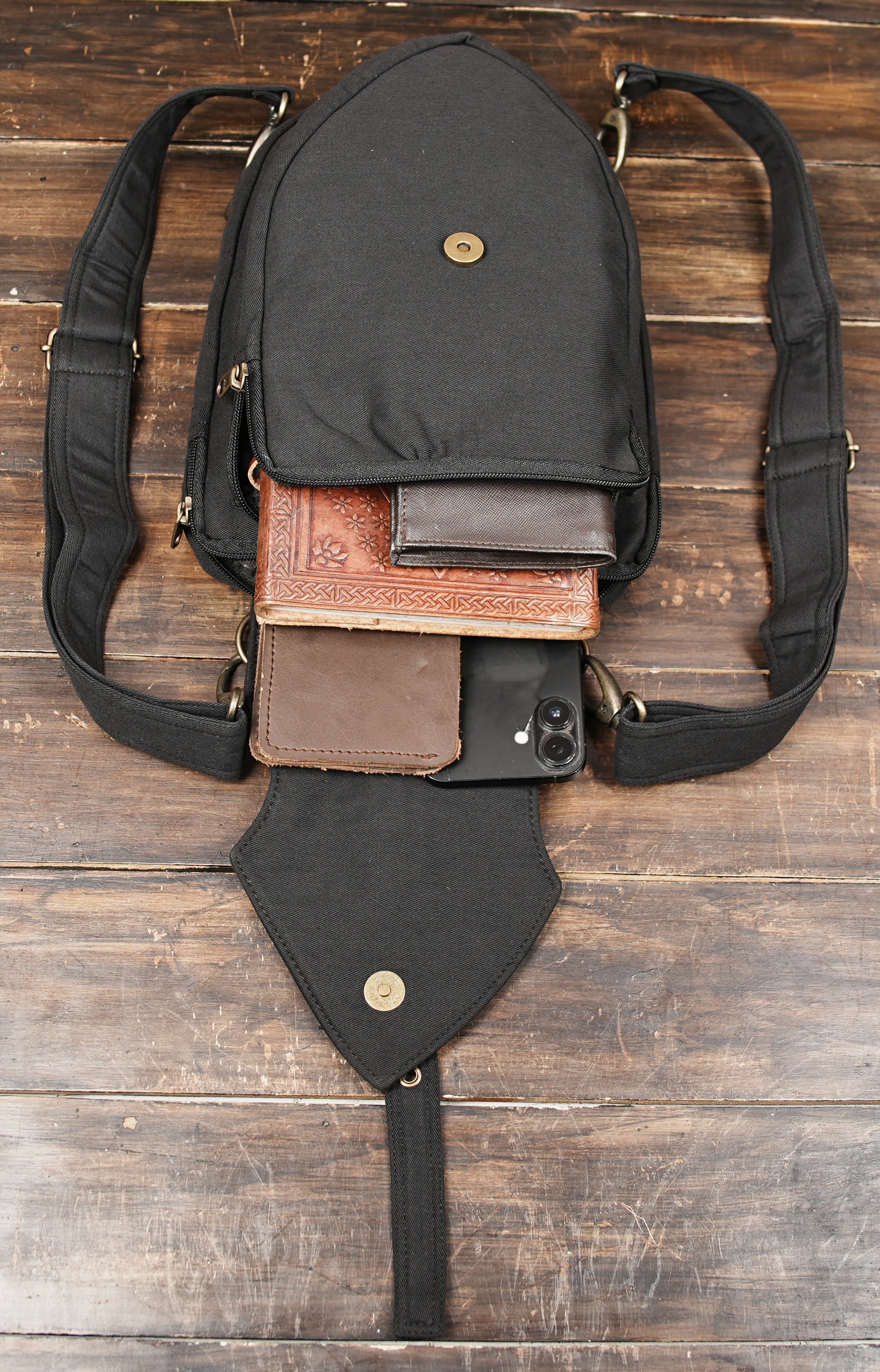Compact black cotton shoulder purse with multiple compartments