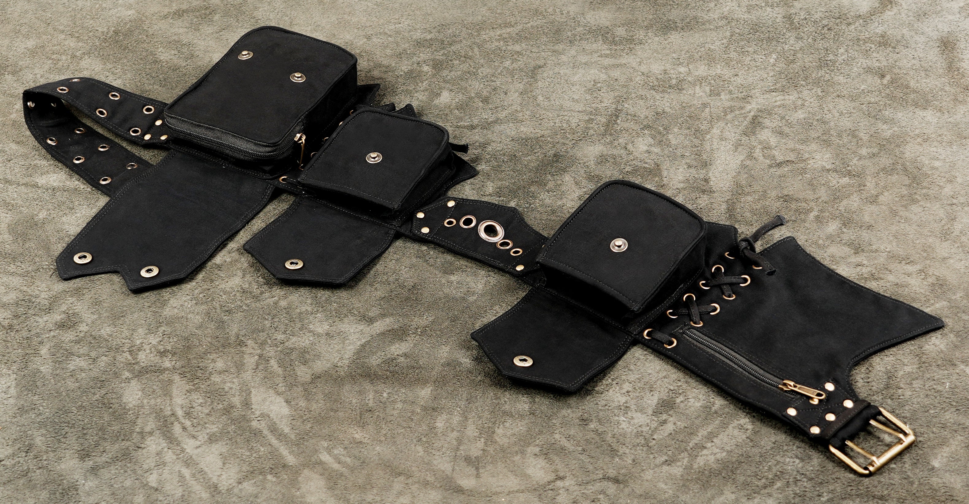 Black alternative fashion belt with multiple pouches and metal accents