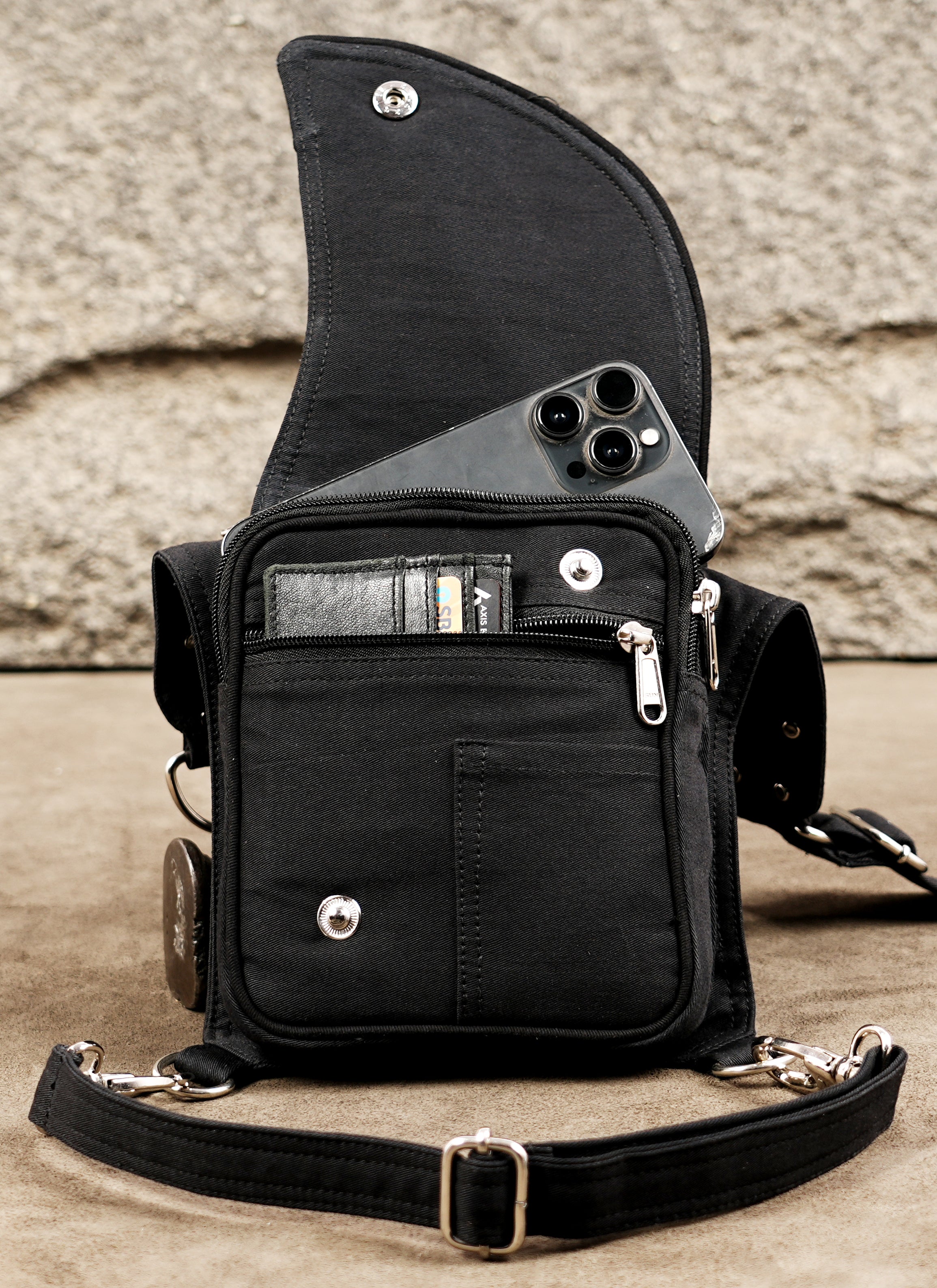 Black cotton leg holster bag with curved snap flap pocket
