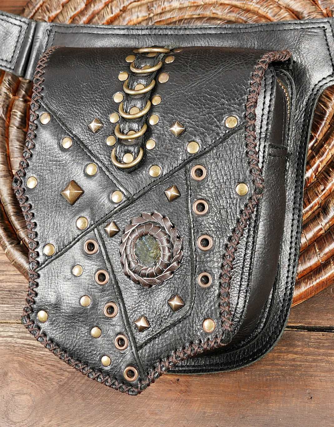 Black leather hip belt with handcrafted pouch and brass hardware