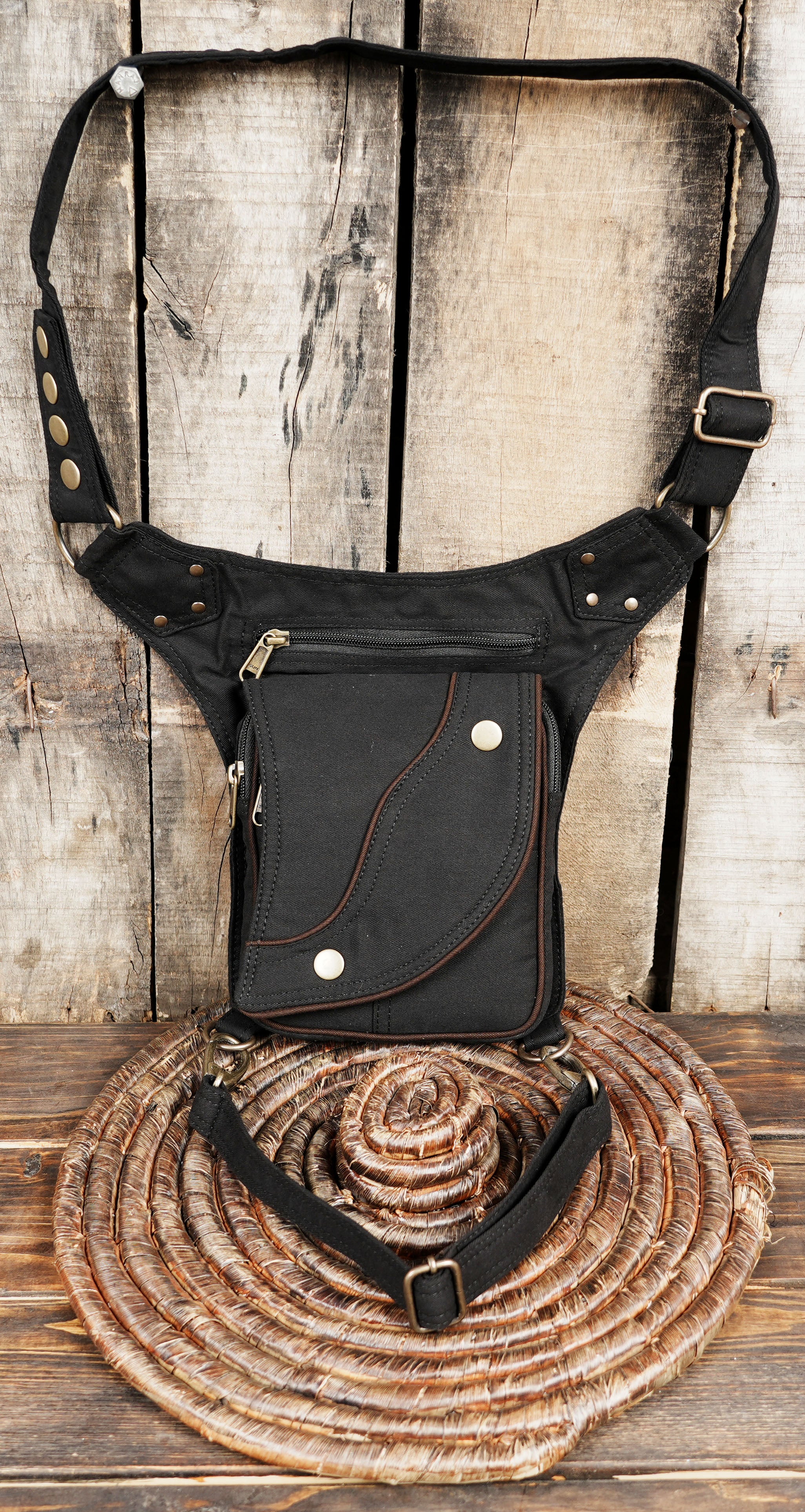 Utility drop leg fanny pack in durable cotton canvas for rave festivals and motorcycle riding.