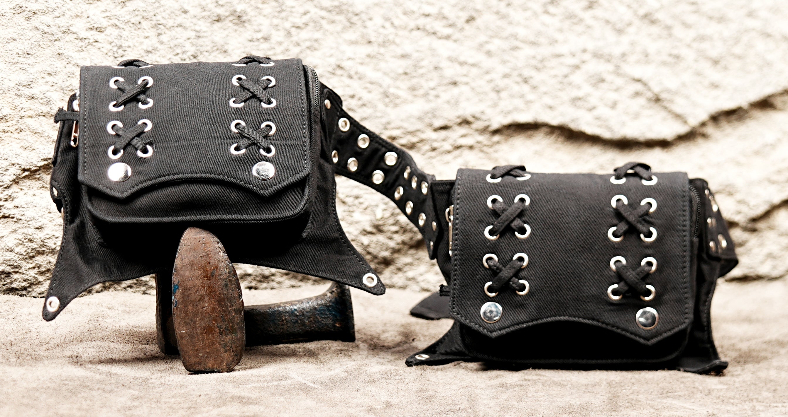 Rock and roll style black studded hip pouch belt with urban street fashion appeal.