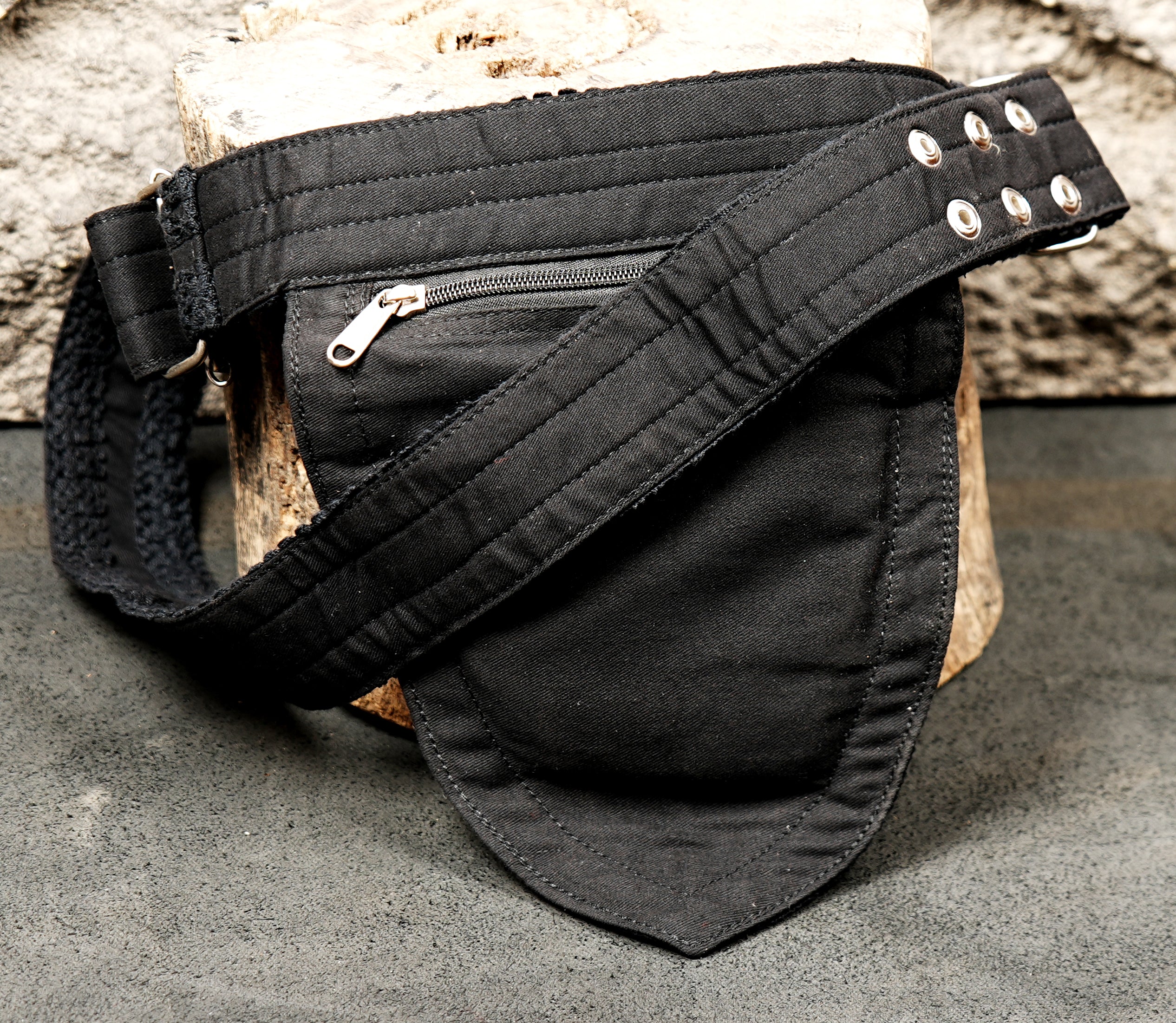 Hands-free black festival belt bag with adjustable waistband and zipper pocket