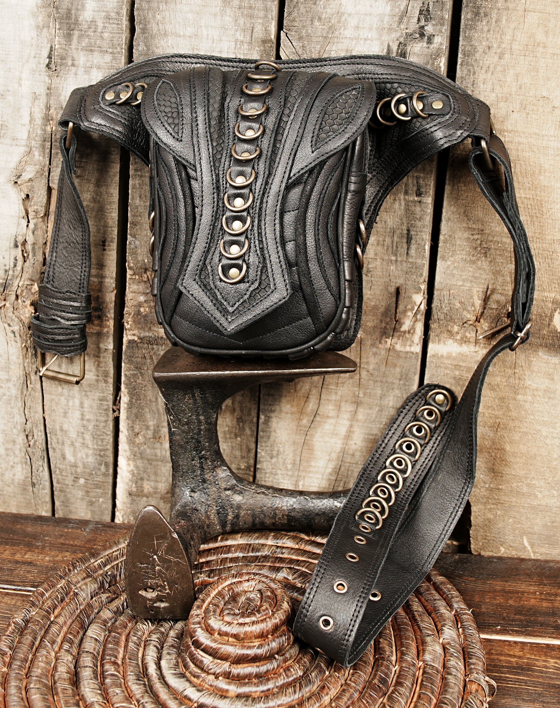 Black genuine leather belt with pouch and strong stitching