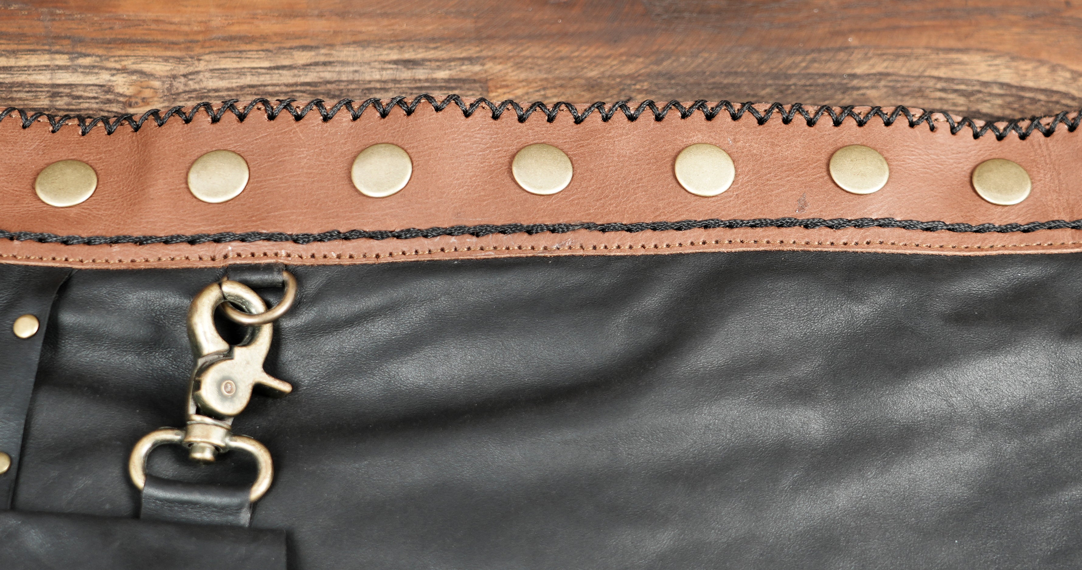 Handmade leather mini skirt with lace panels.